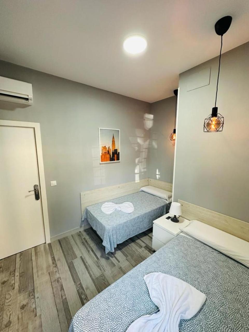 Habitación Doble con Baño Compartido