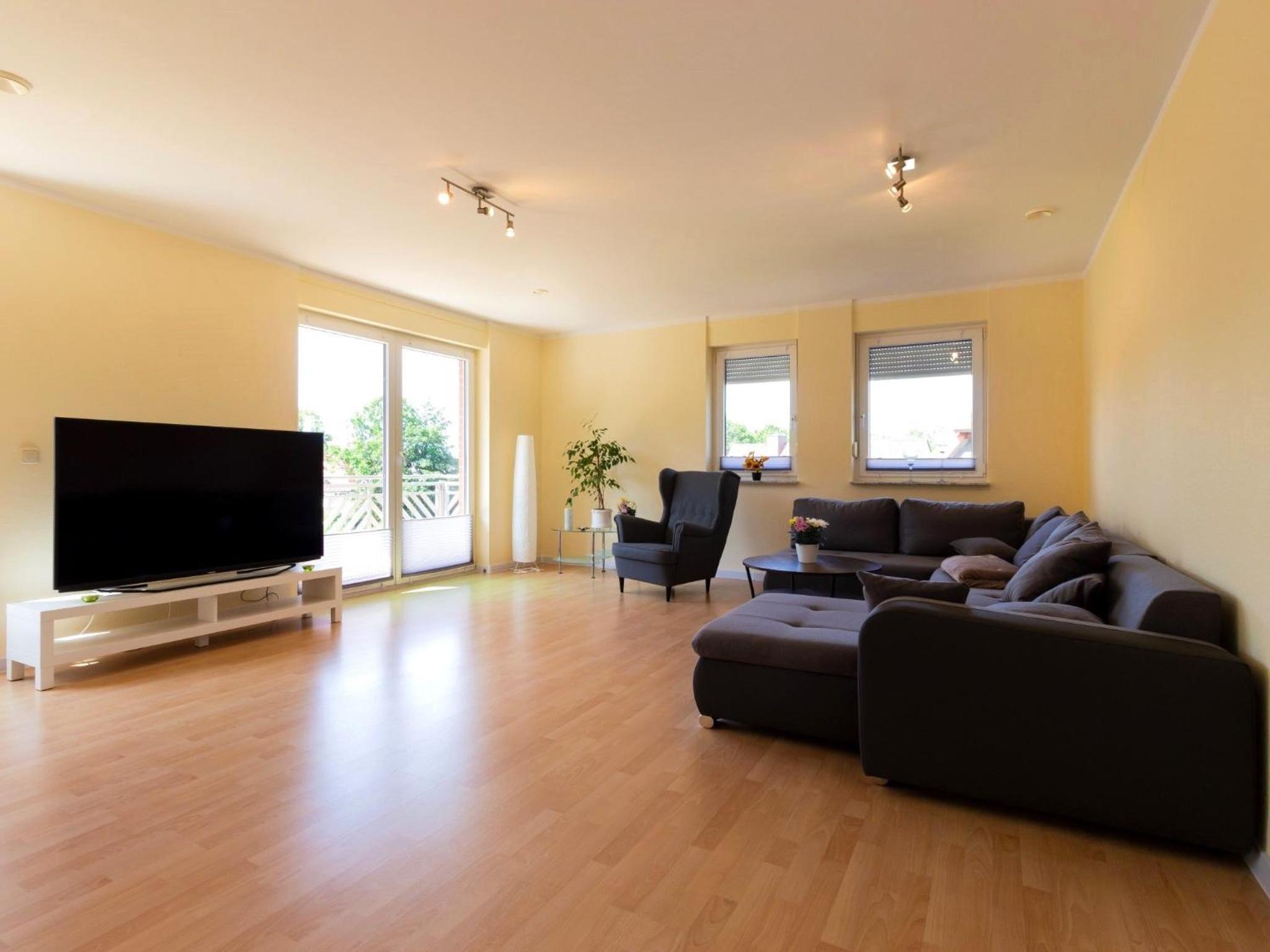 Three-Bedroom Apartment with Balcony and Terrace photo 1