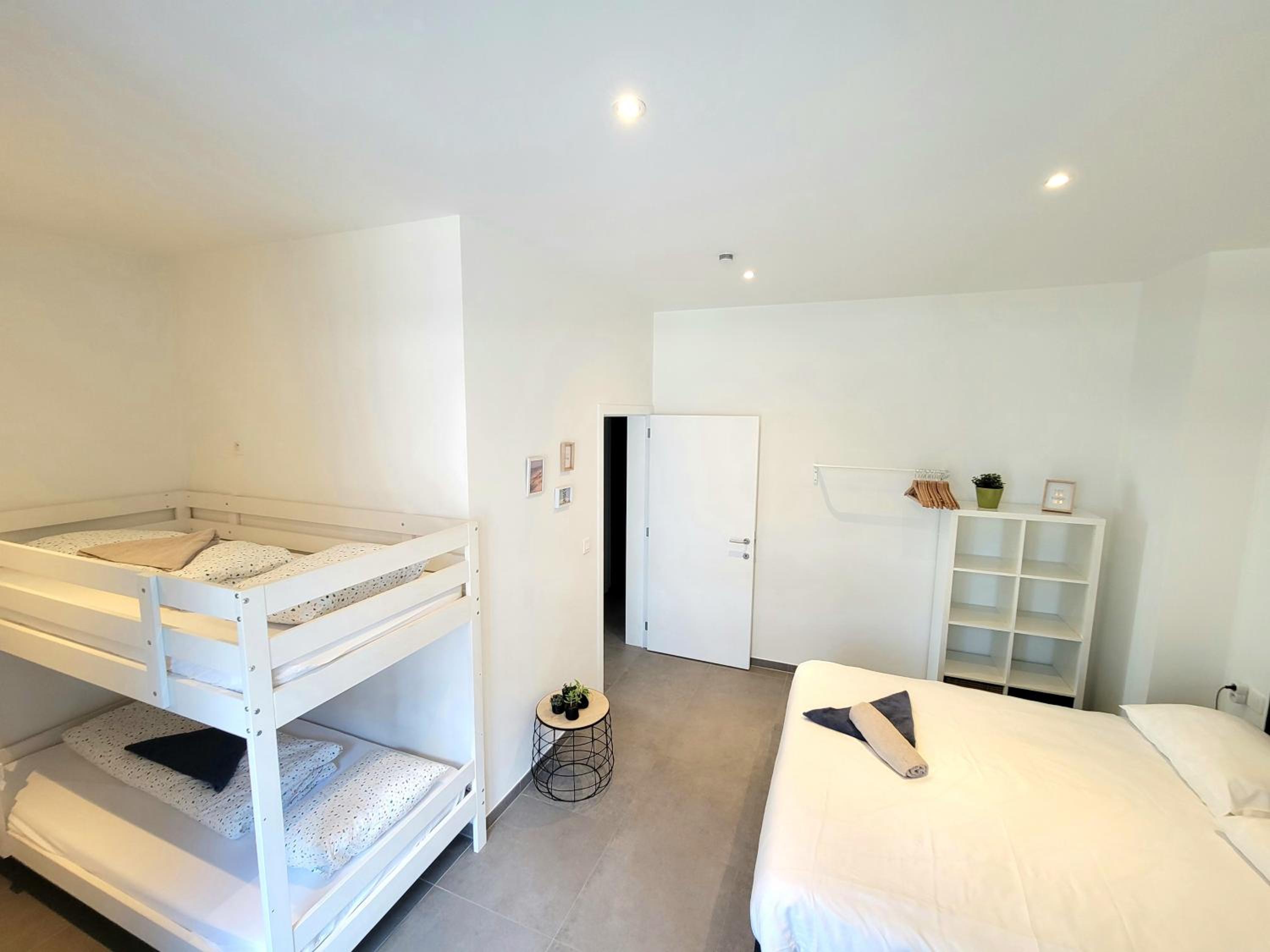 Three-Bedroom Apartment - Photo 7