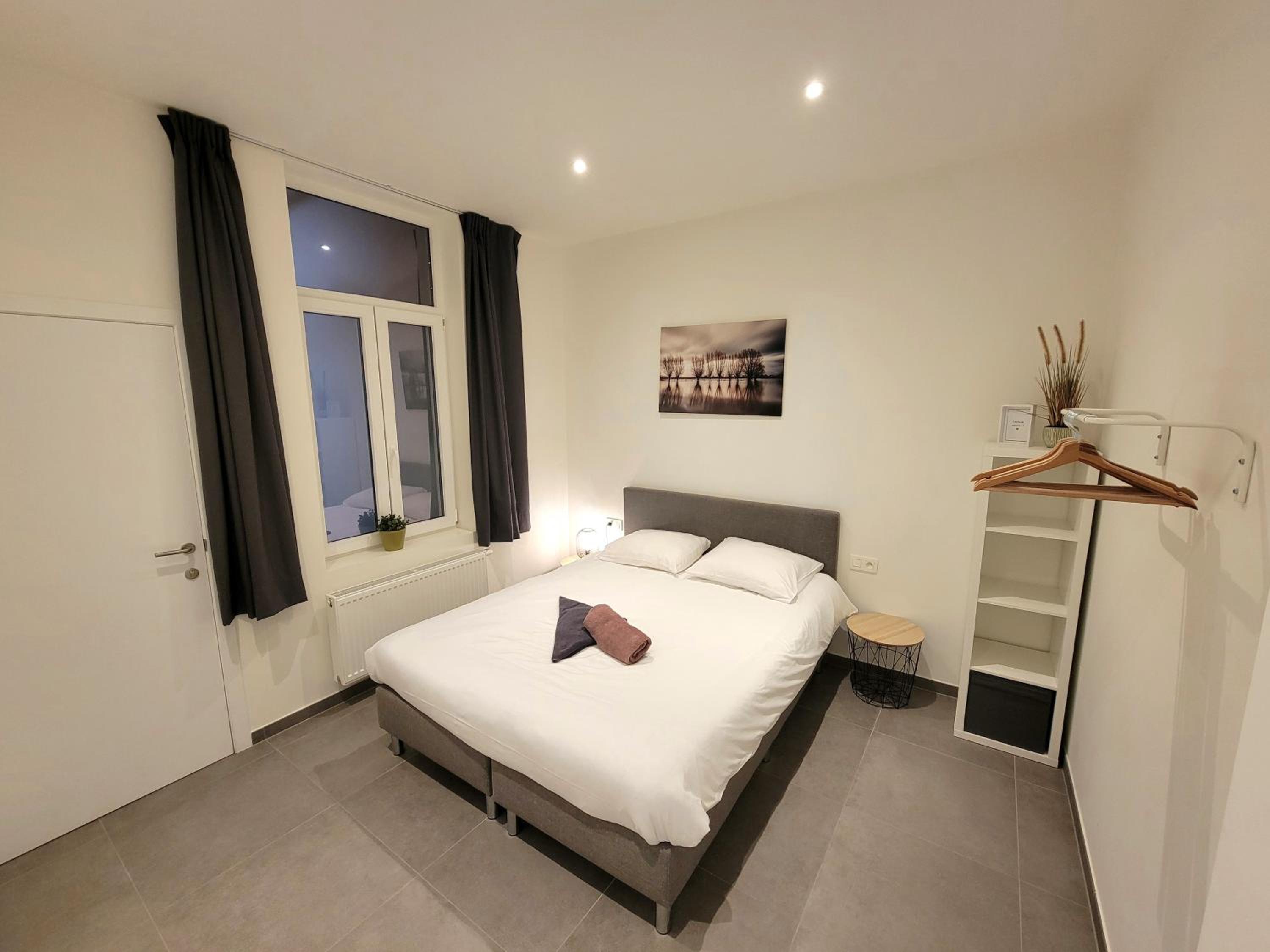 Three-Bedroom Apartment - Photo 2