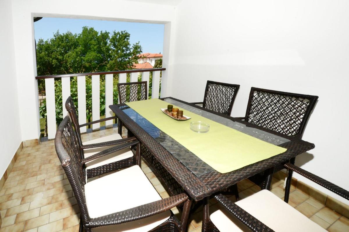 Three-Bedroom Apartment with Balcony