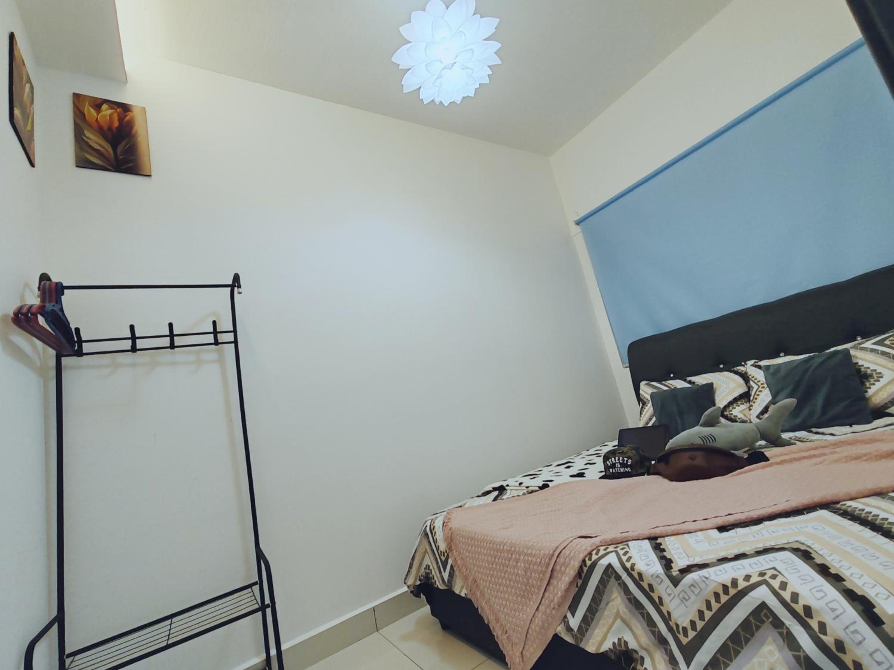 Three-Bedroom Apartment - Photo 39