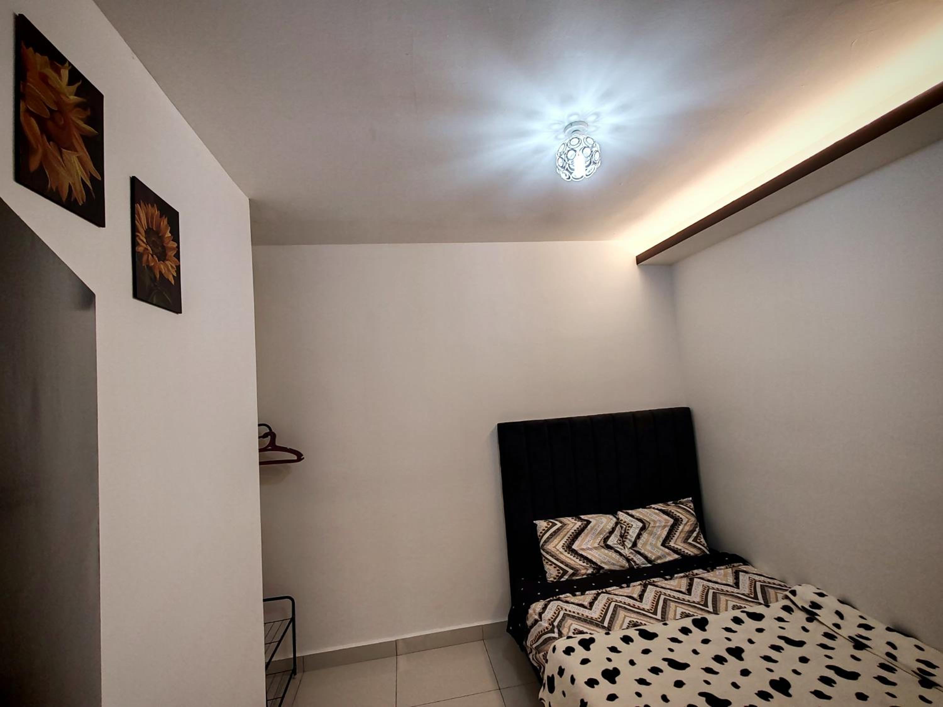 Three-Bedroom Apartment - Photo 52