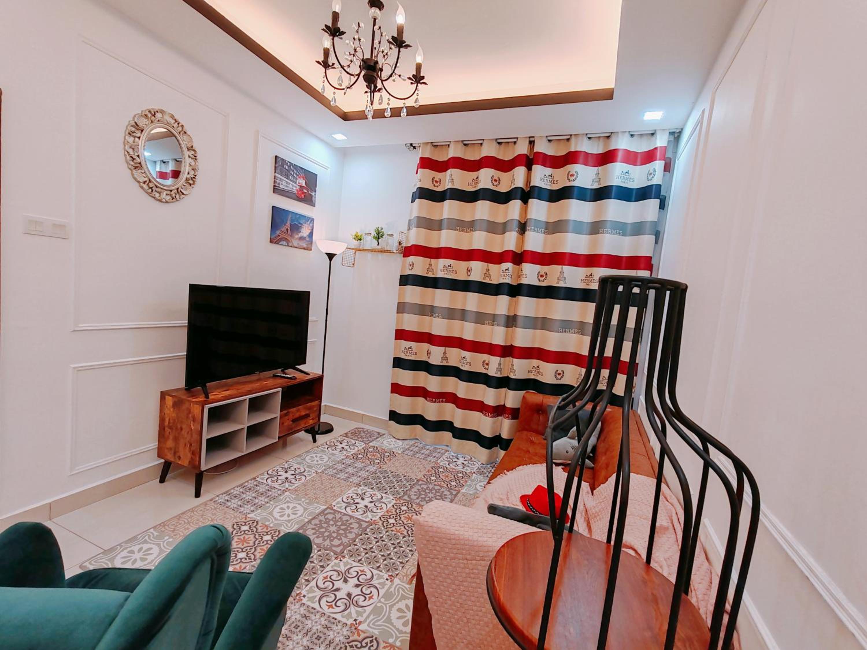 Three-Bedroom Apartment - Photo 30