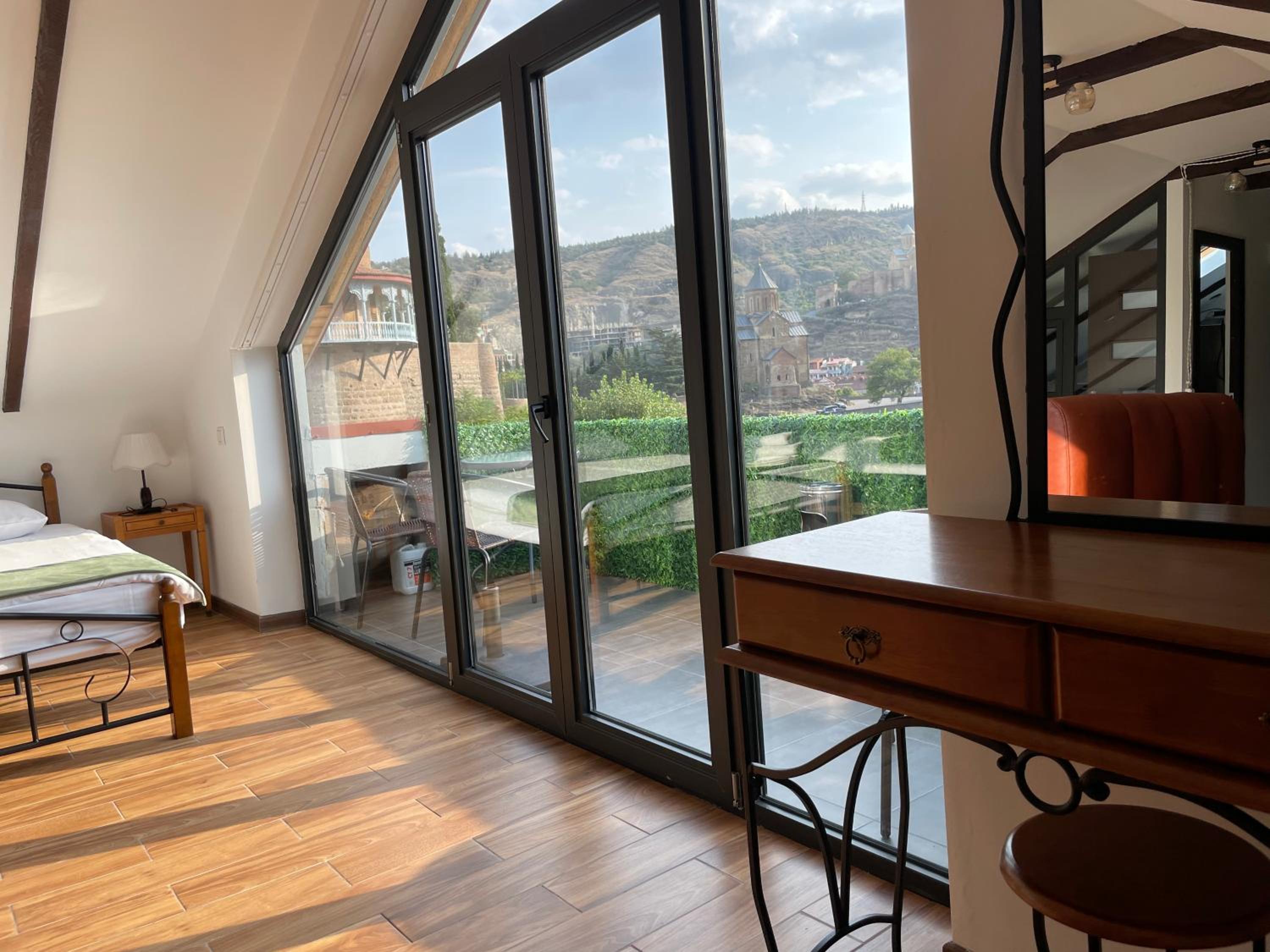 Family Room with Balcony - Photo 5