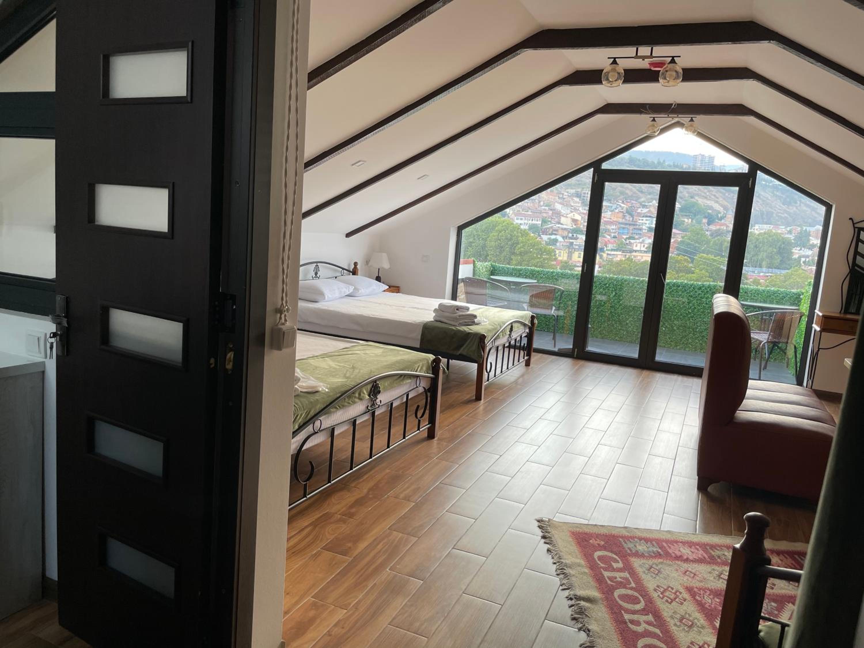 Family Room with Balcony - Photo 4