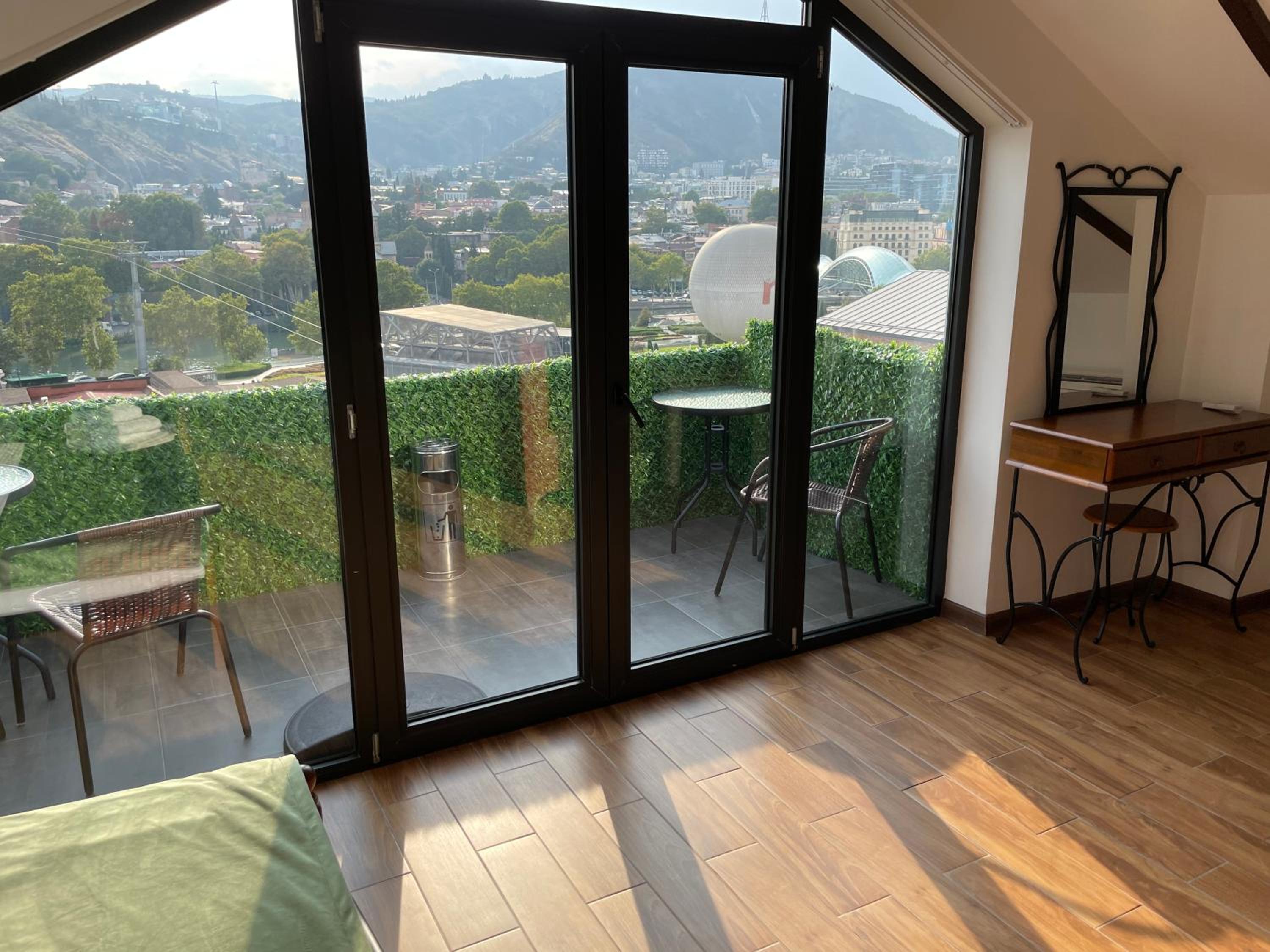 Family Room with Balcony - Photo 2