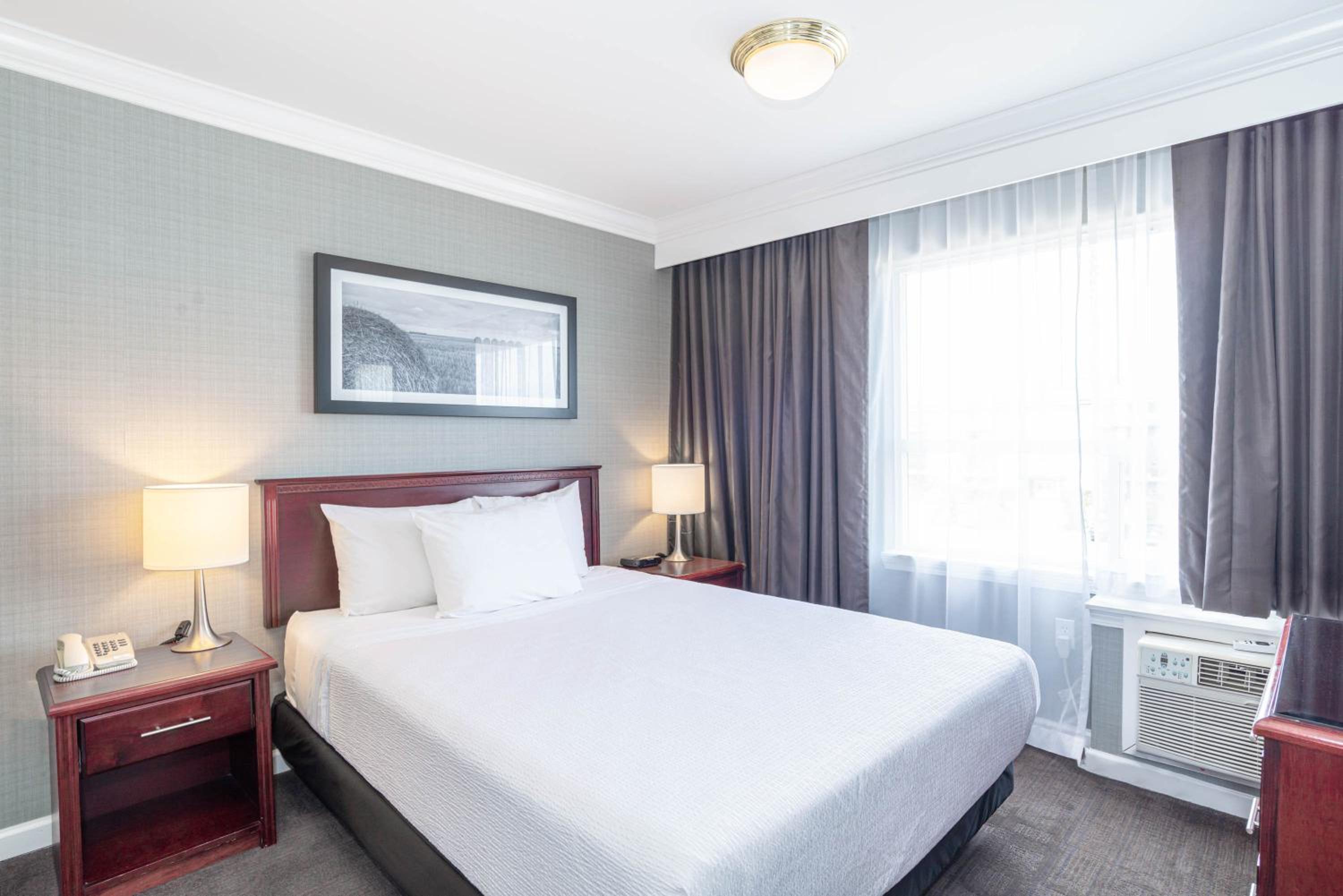 Standard Suite, 1 Queen Bed, Kitchenette - Photo 1