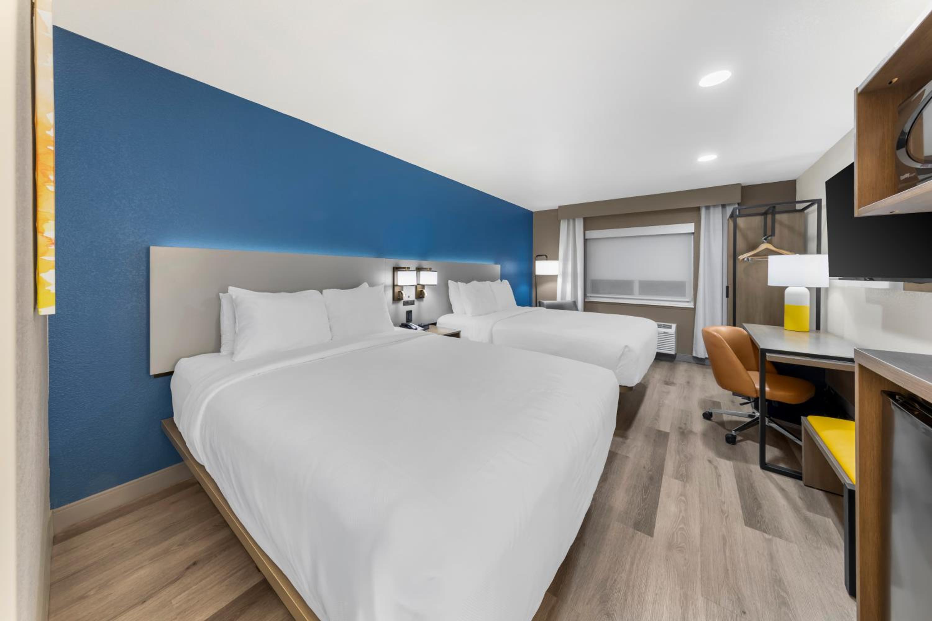 Quadruple Room with Two Queen Beds - Non Smoking/Interior Hall photo 1