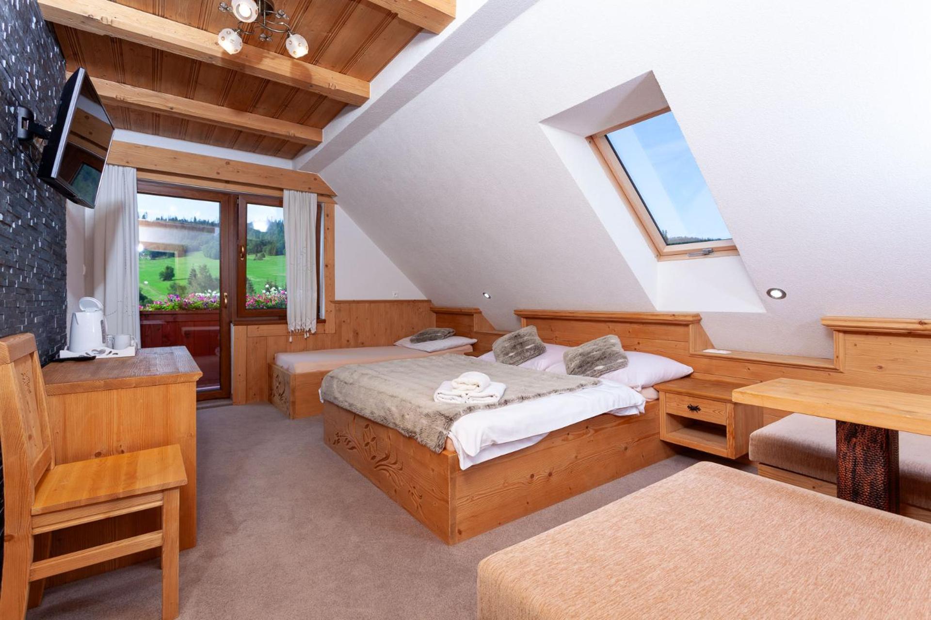 Deluxe Triple Room - Photo 1