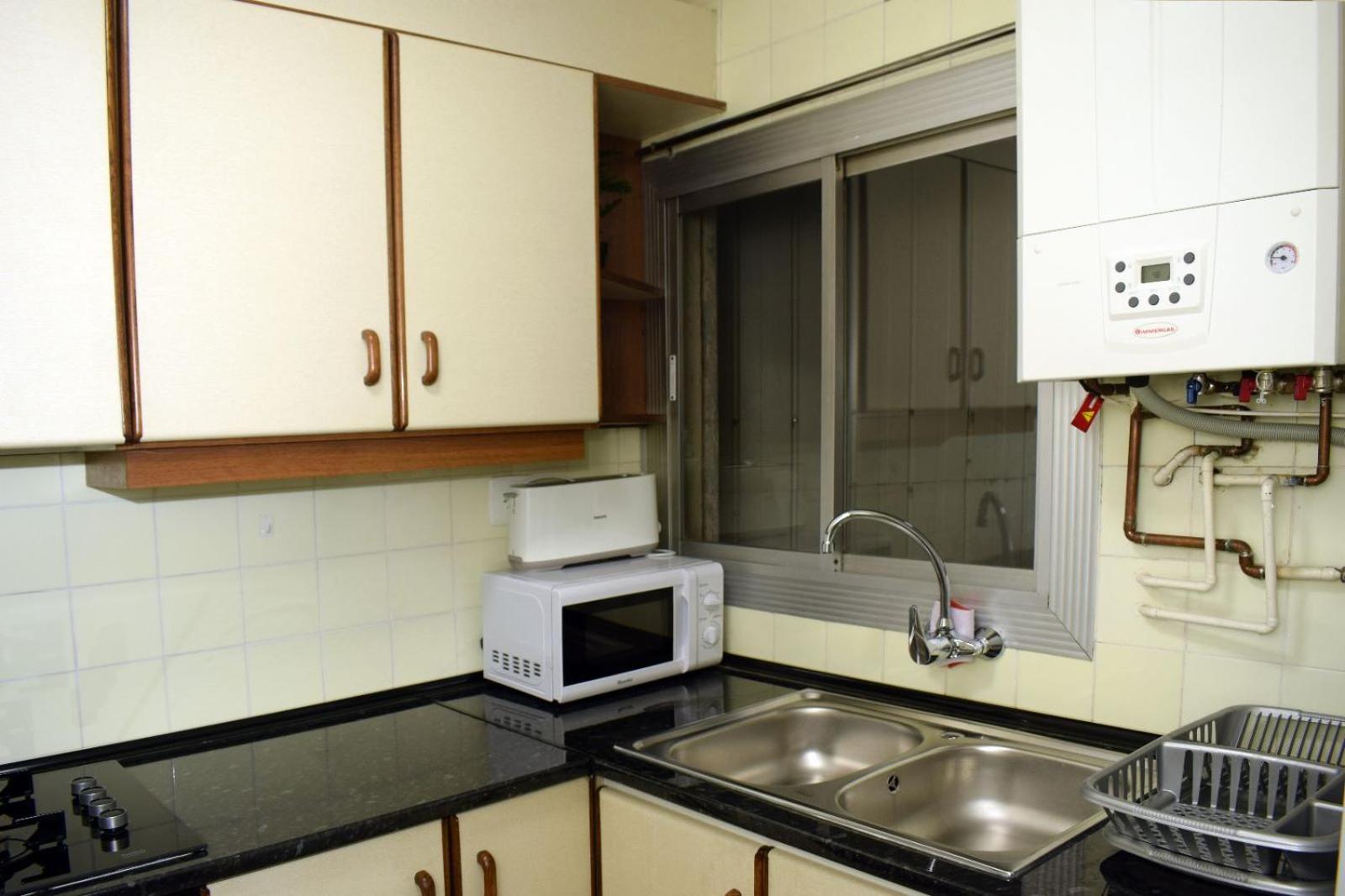 Three-Bedroom Apartment photo 2