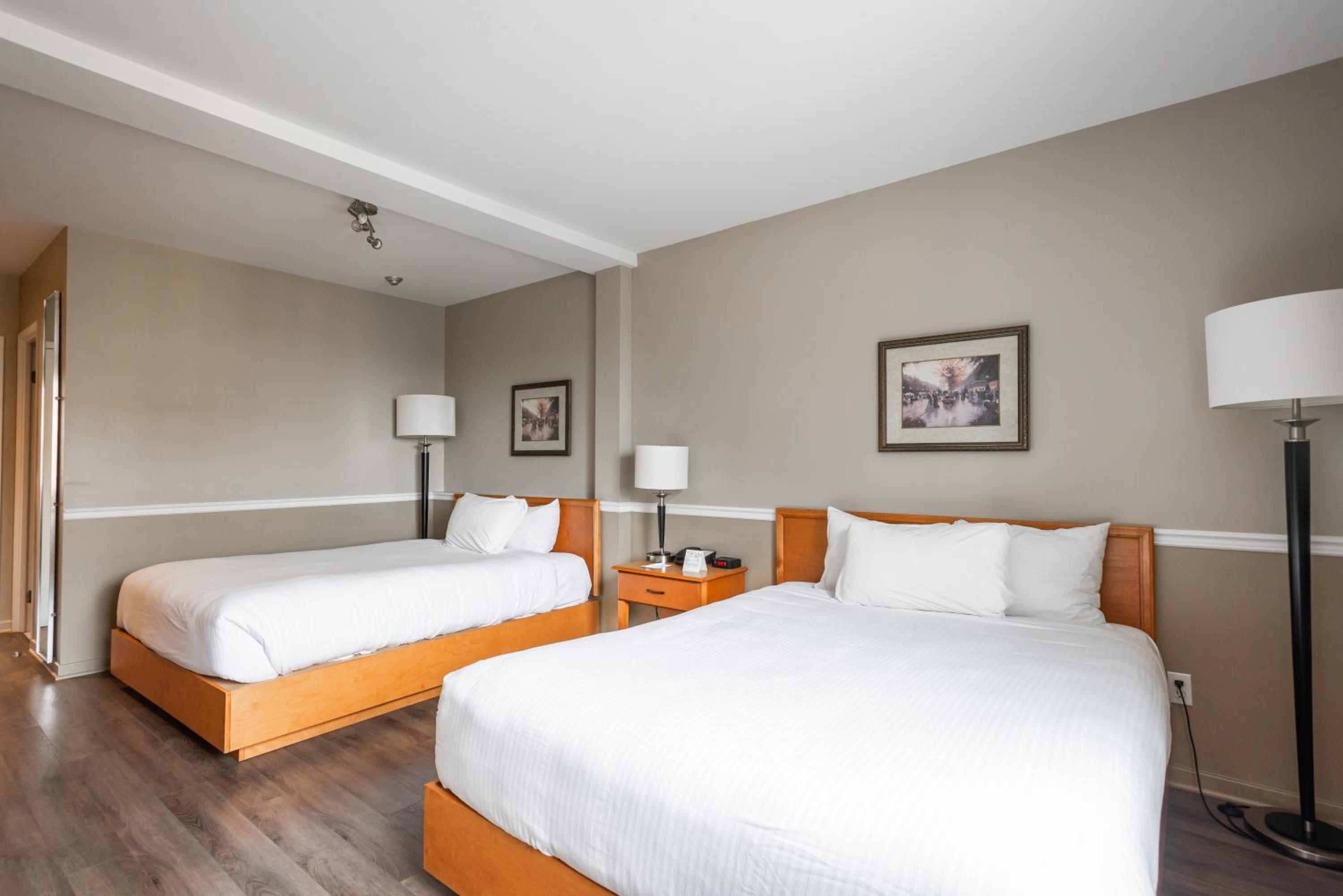 Queen Room with Two Queen Beds - Photo 1