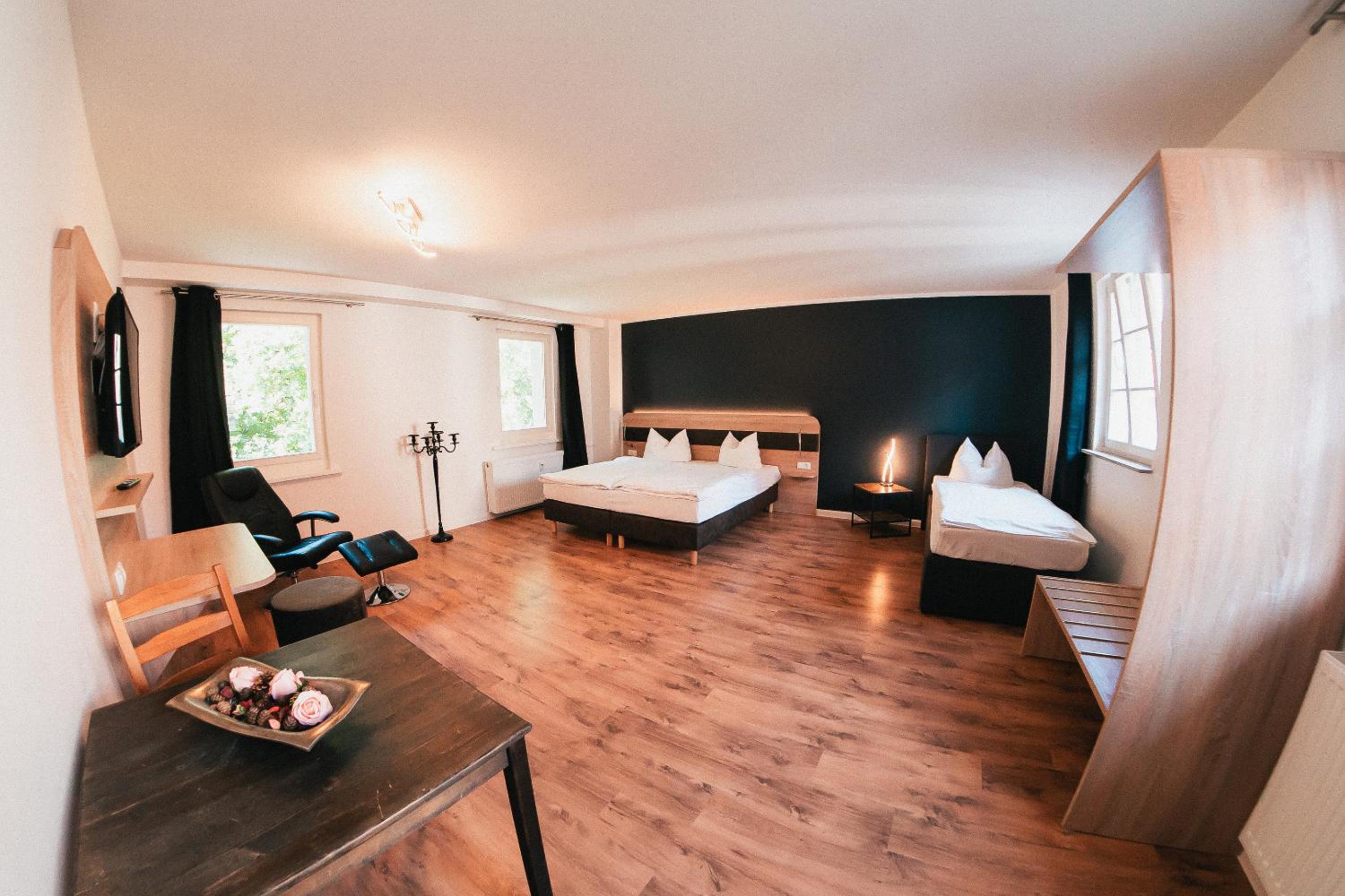 Deluxe Triple Room - Photo 16