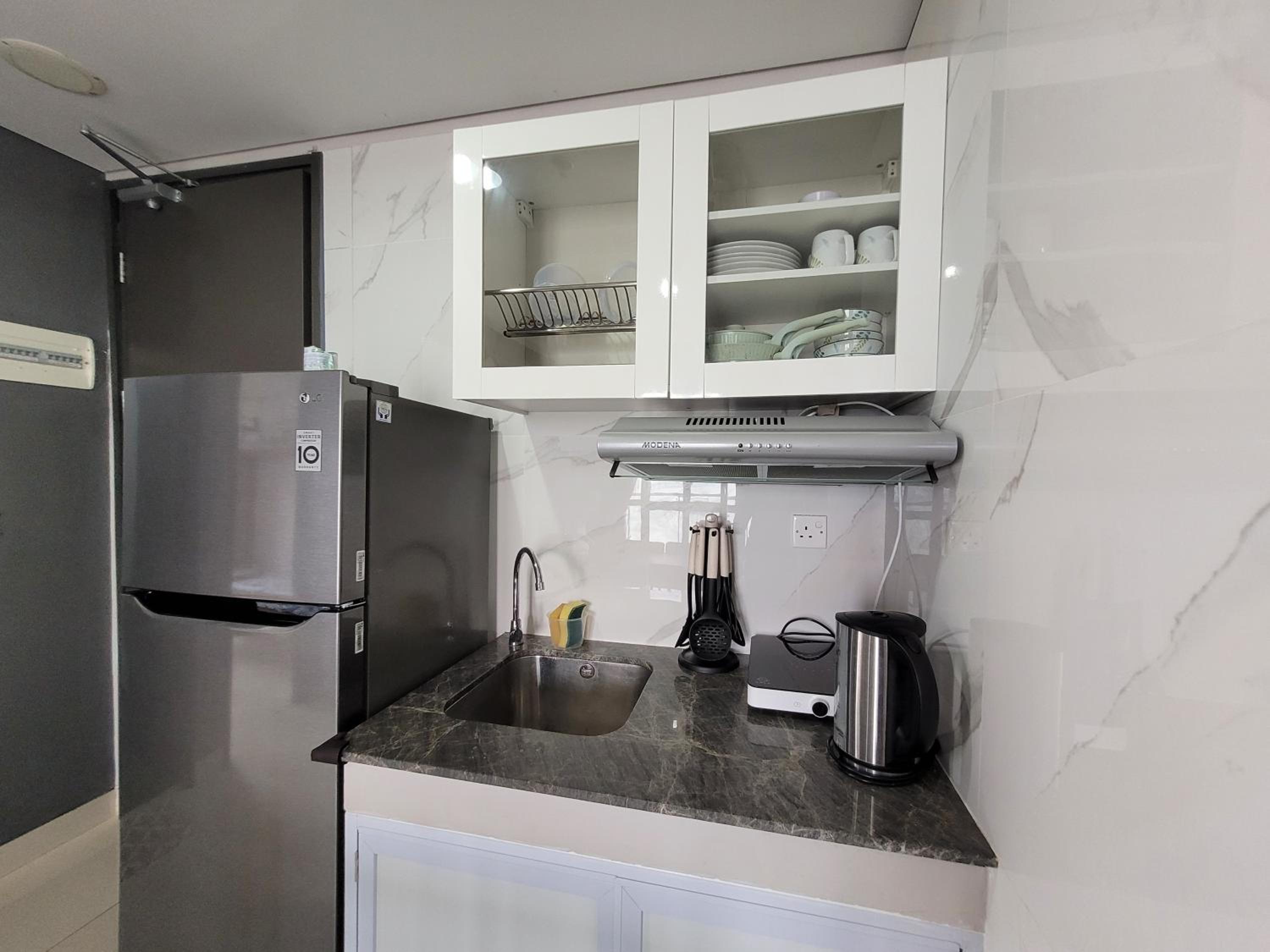 Three-Bedroom Apartment - Photo 6
