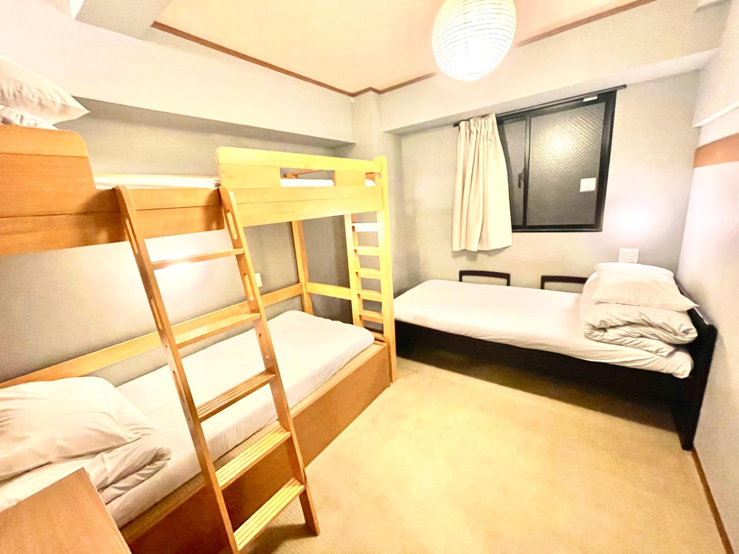 Economy Triple Room with Shared Bathroom photo 1