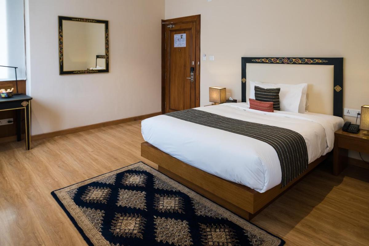 Deluxe Room - Photo 1