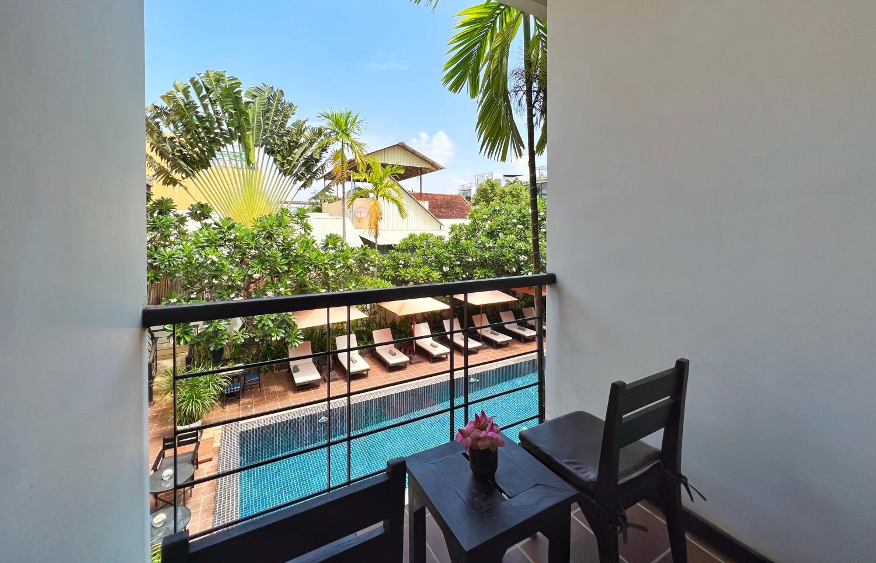 Deluxe Double Pool View with Balcony - Photo 7