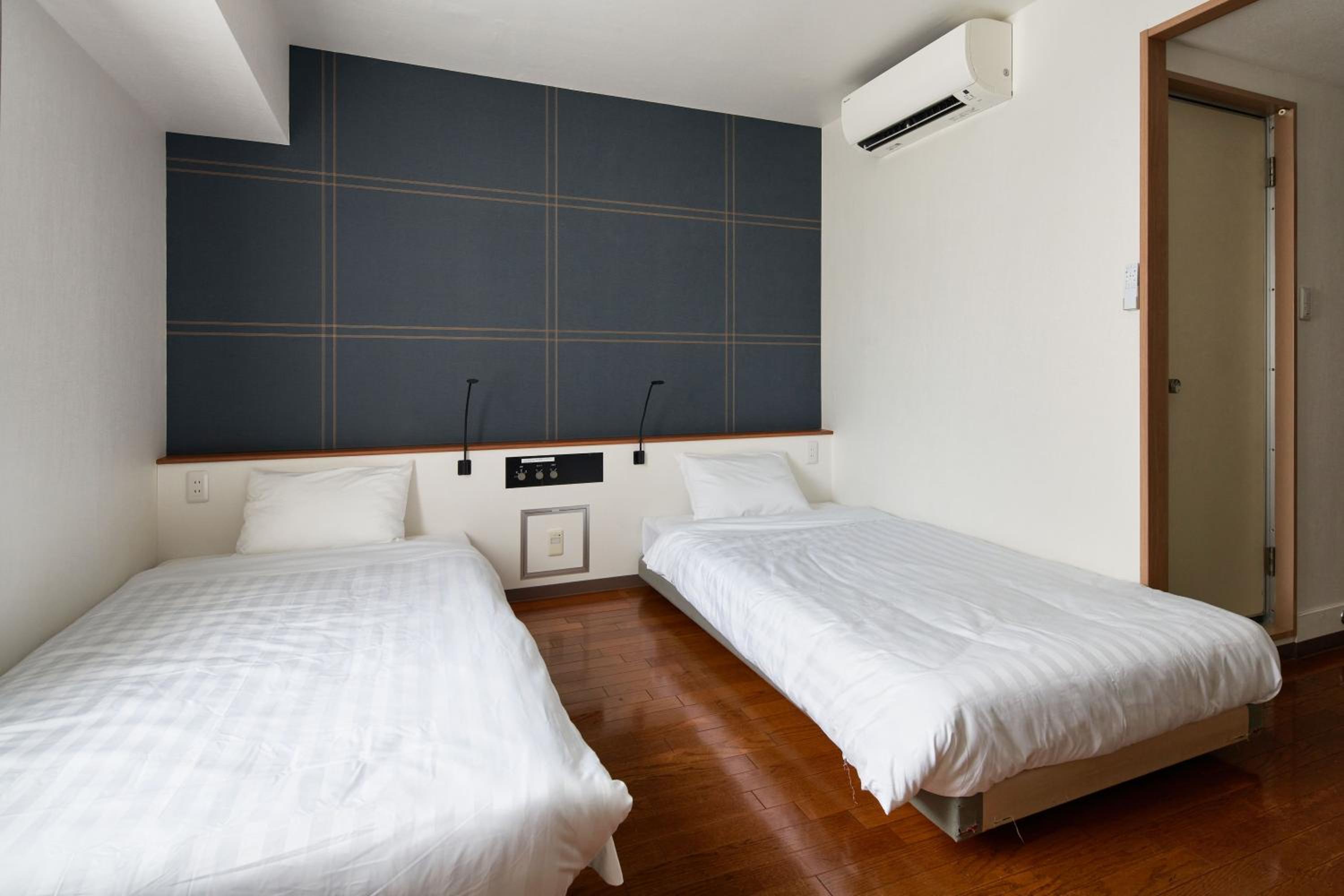 Twin Room - Non-Smoking - No Cleaning for Consecutive Night Stays photo 3
