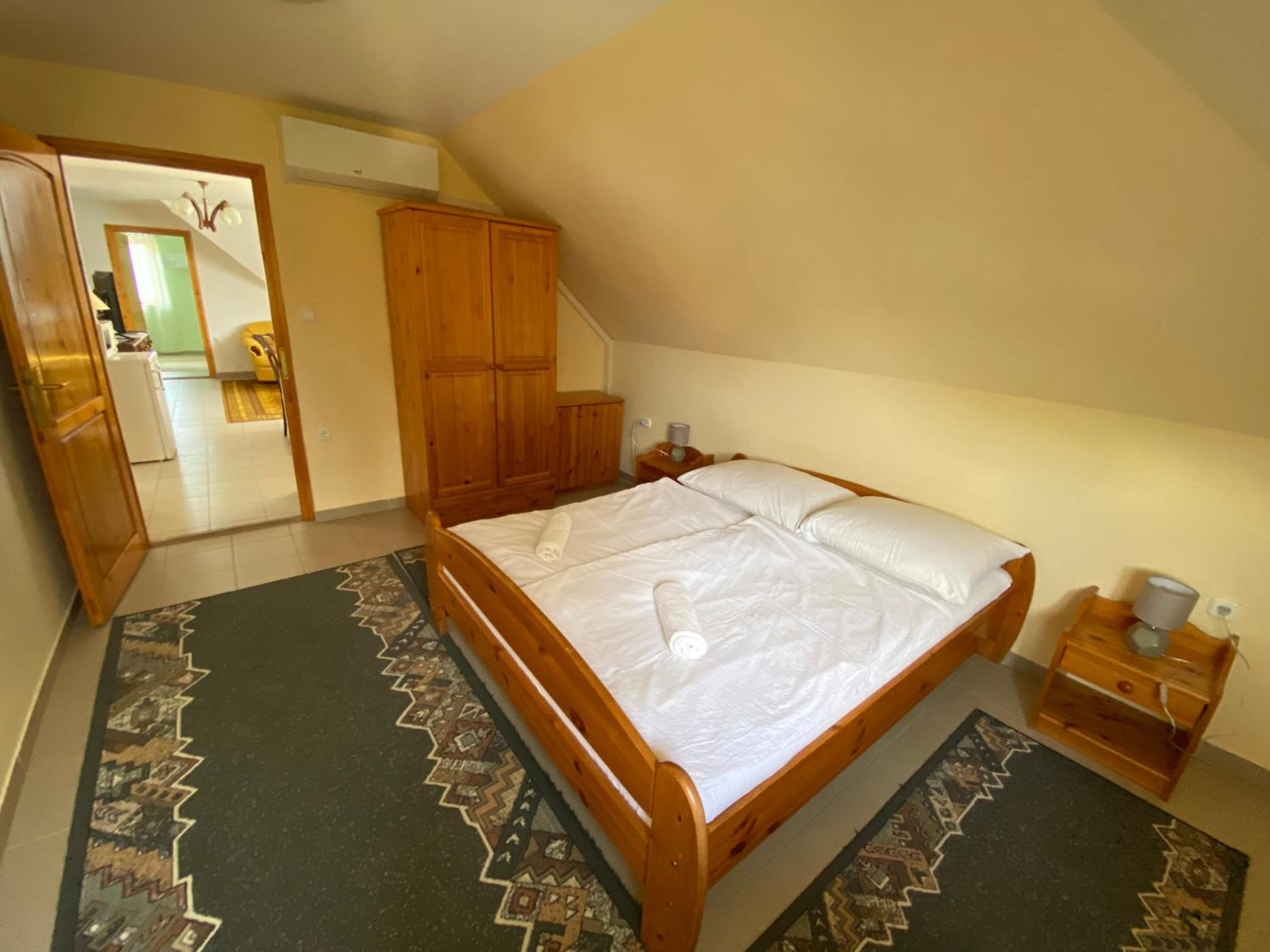 Three-Bedroom Apartment - Photo 12