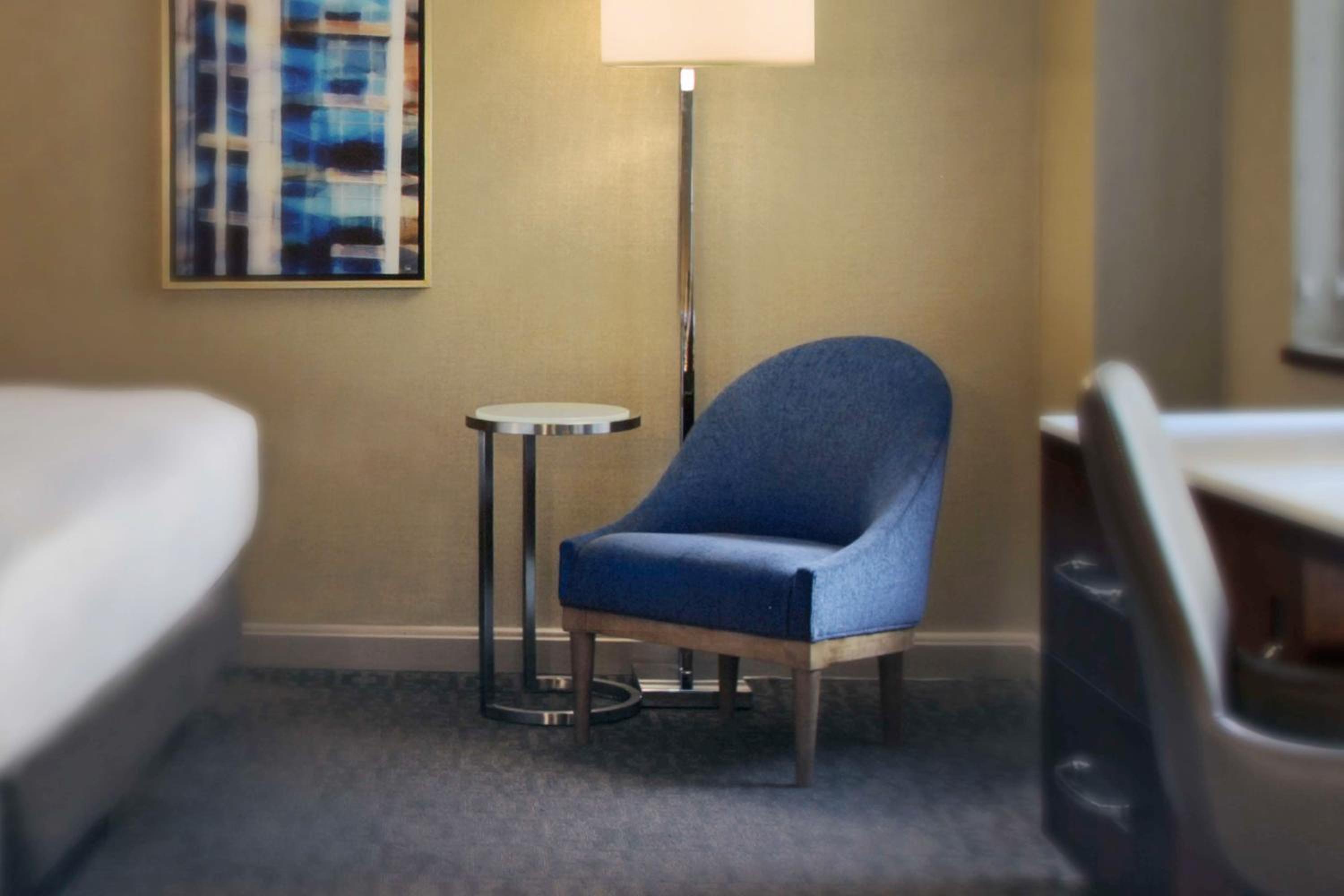 Relax in stylish comfort with a cozy reading nook.