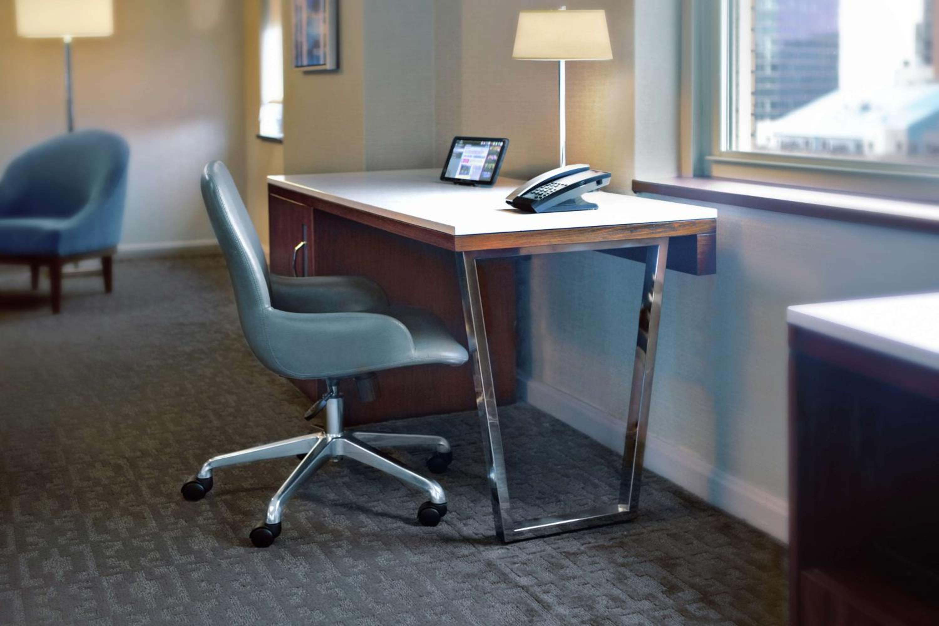 Inspire productivity in our modern meeting area.