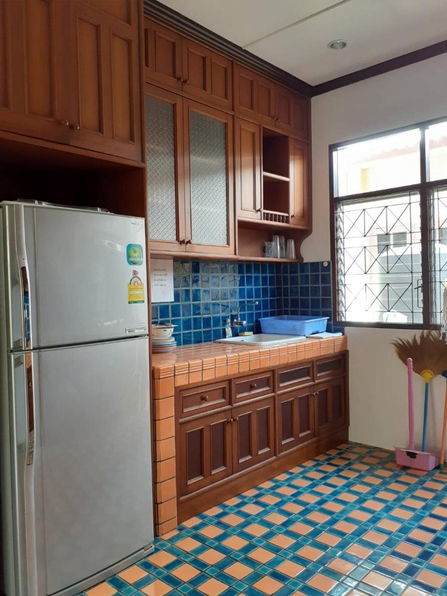 Three-Bedroom House - Photo 23
