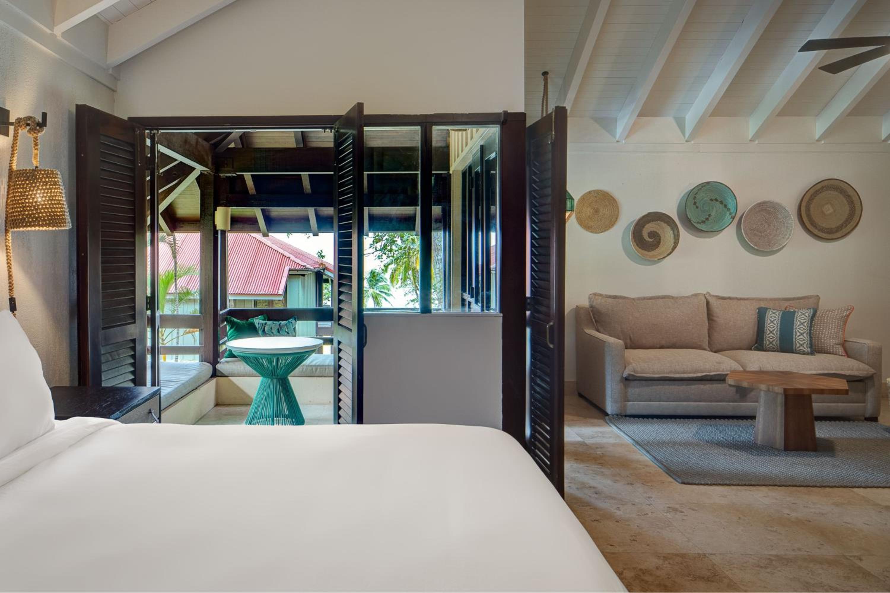 Junior King Suite with Sofa Bed, Patio and Garden View photo 3