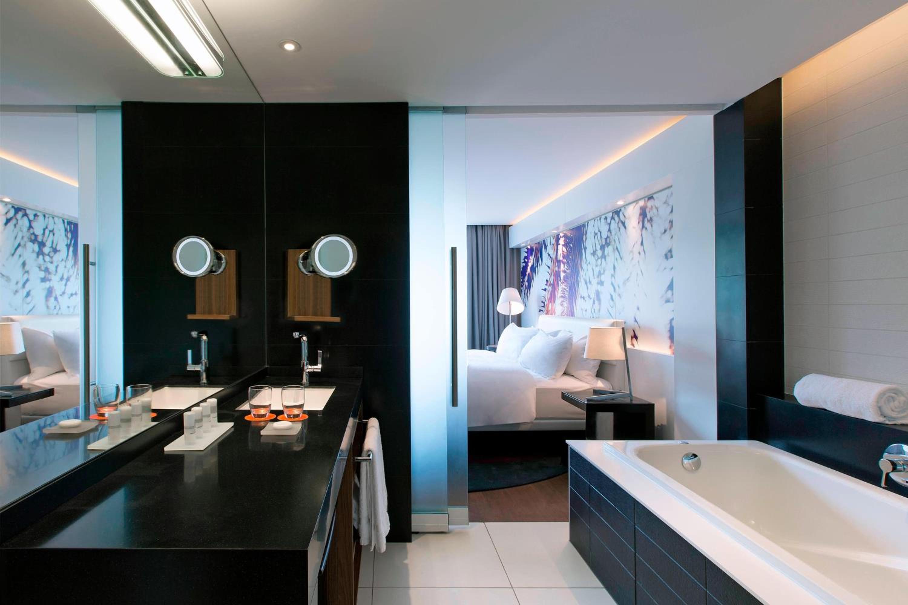 Two Bedroom Suite with Balcony and Garden View, 1 King Bed, 2 Twins and Sofa Bed