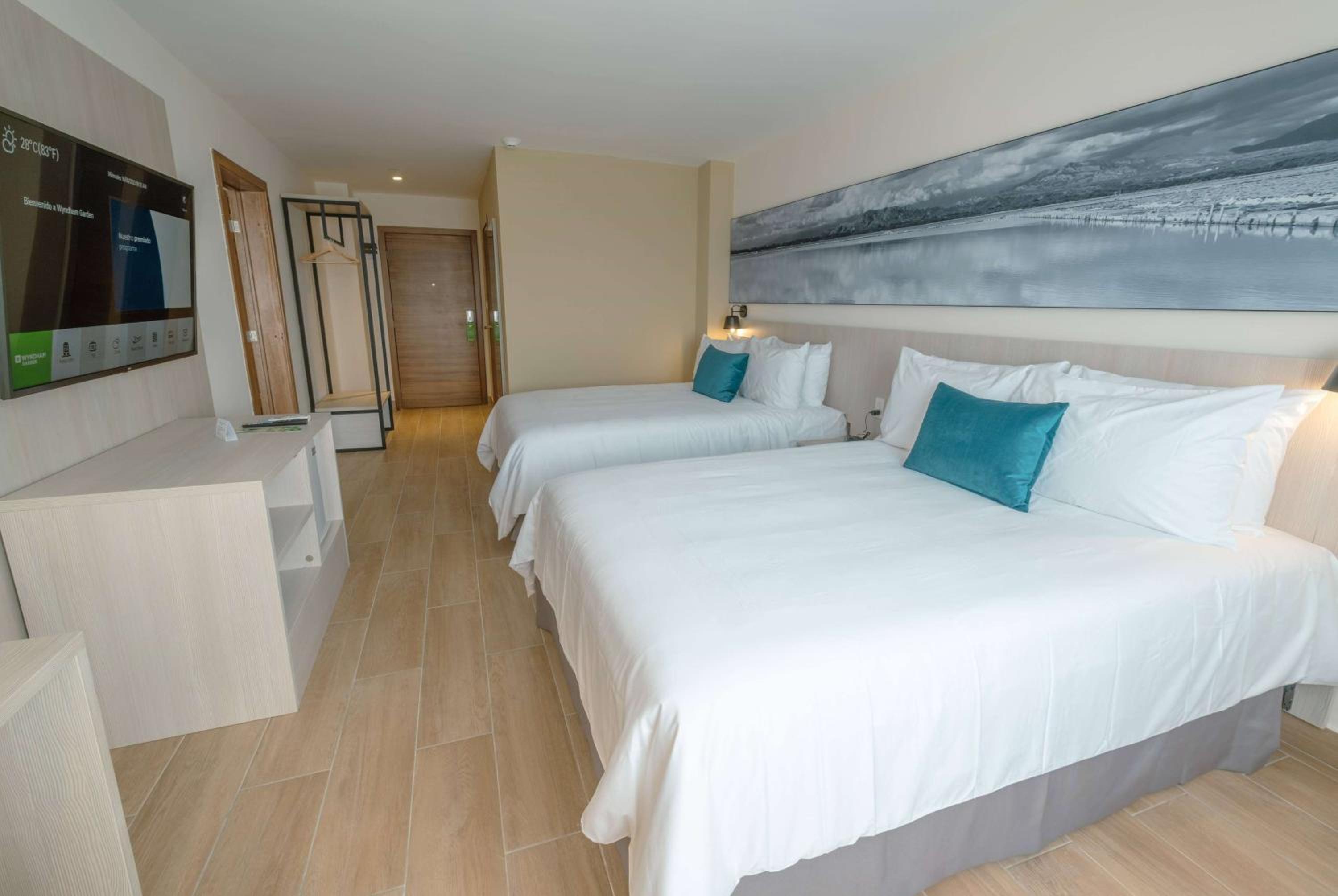 Queen Room with Two Queen Beds - Non-Smoking - Photo 1