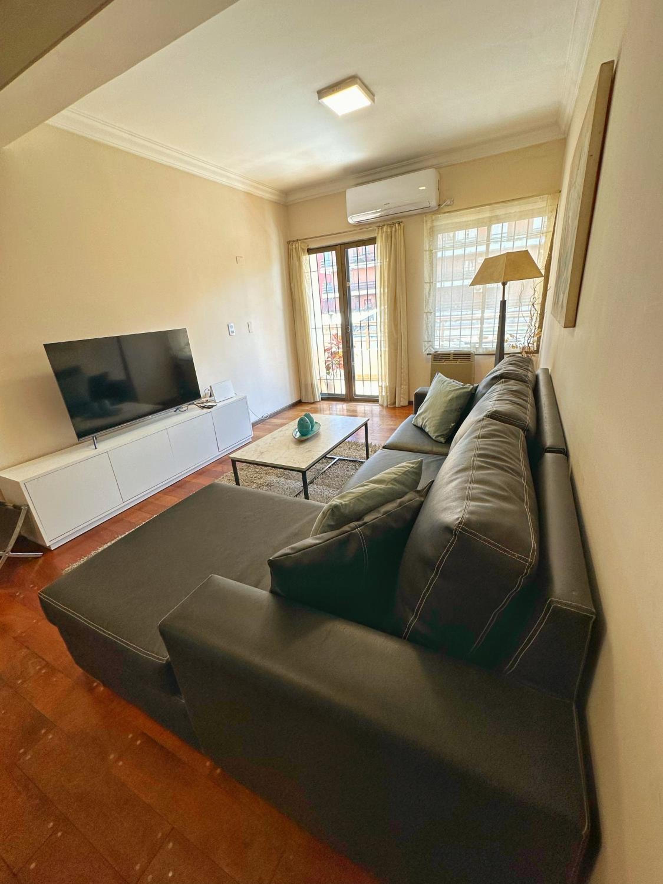 Three-Bedroom Apartment photo 1