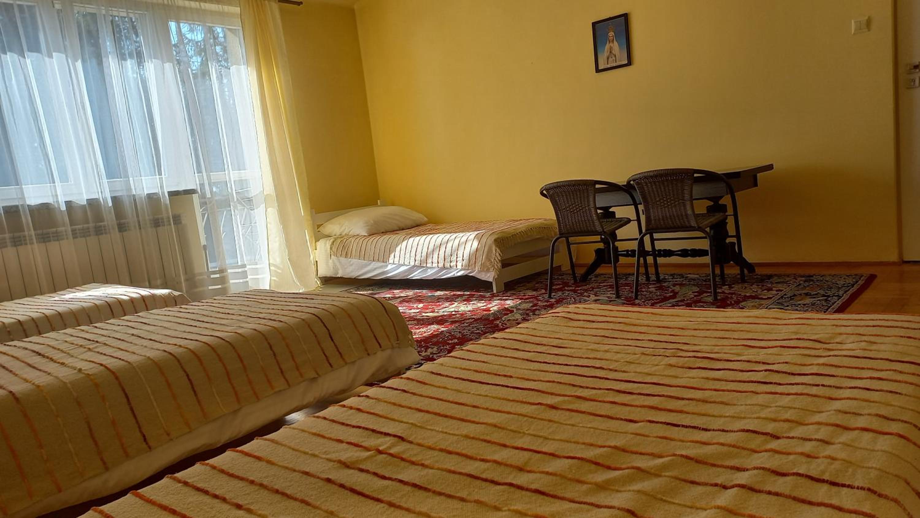 Three-Bedroom Apartment - Photo 3