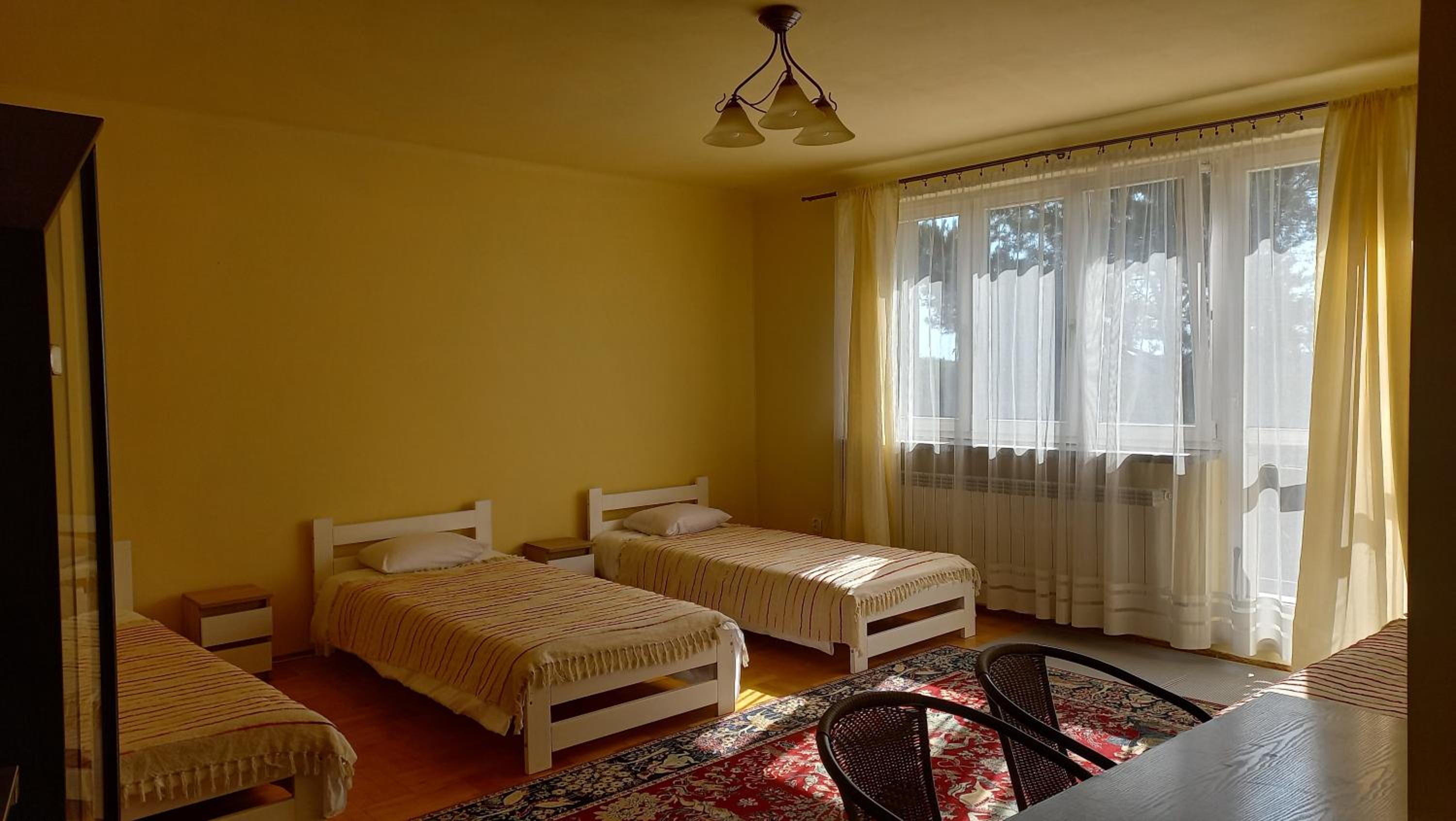 Three-Bedroom Apartment - Photo 5
