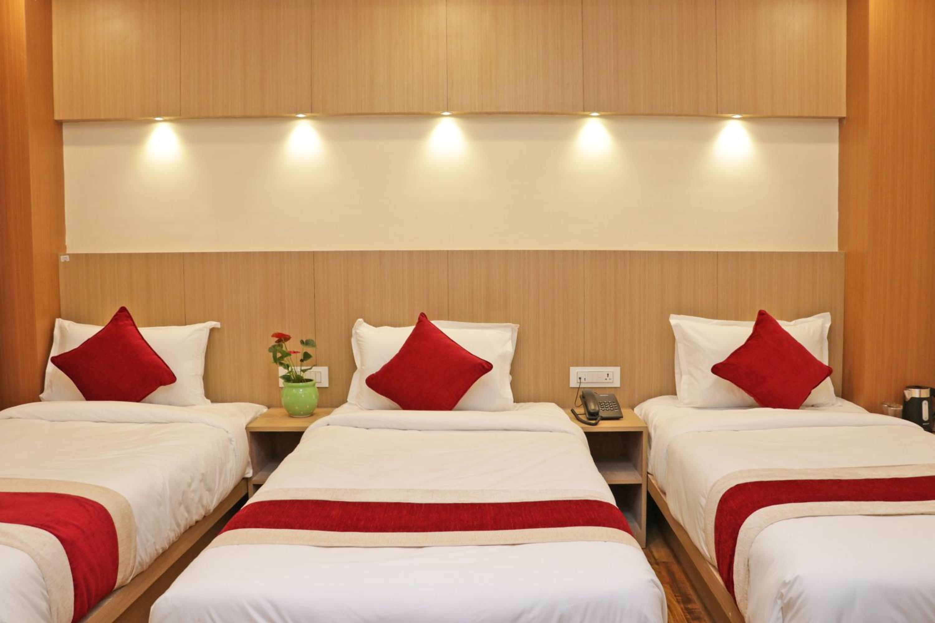 Deluxe Triple Room - Photo 10