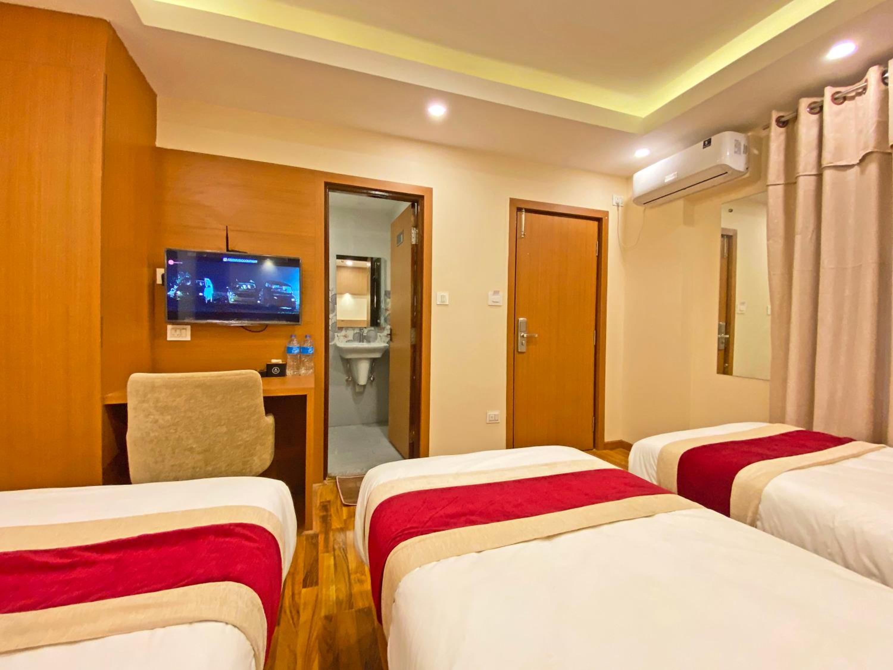Deluxe Triple Room - Photo 14