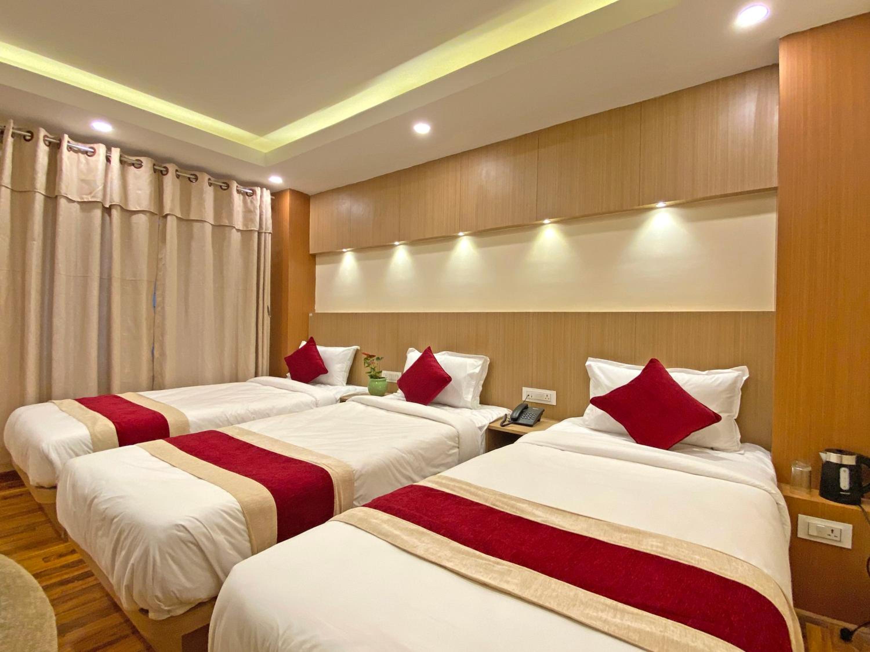 Deluxe Triple Room - Photo 16