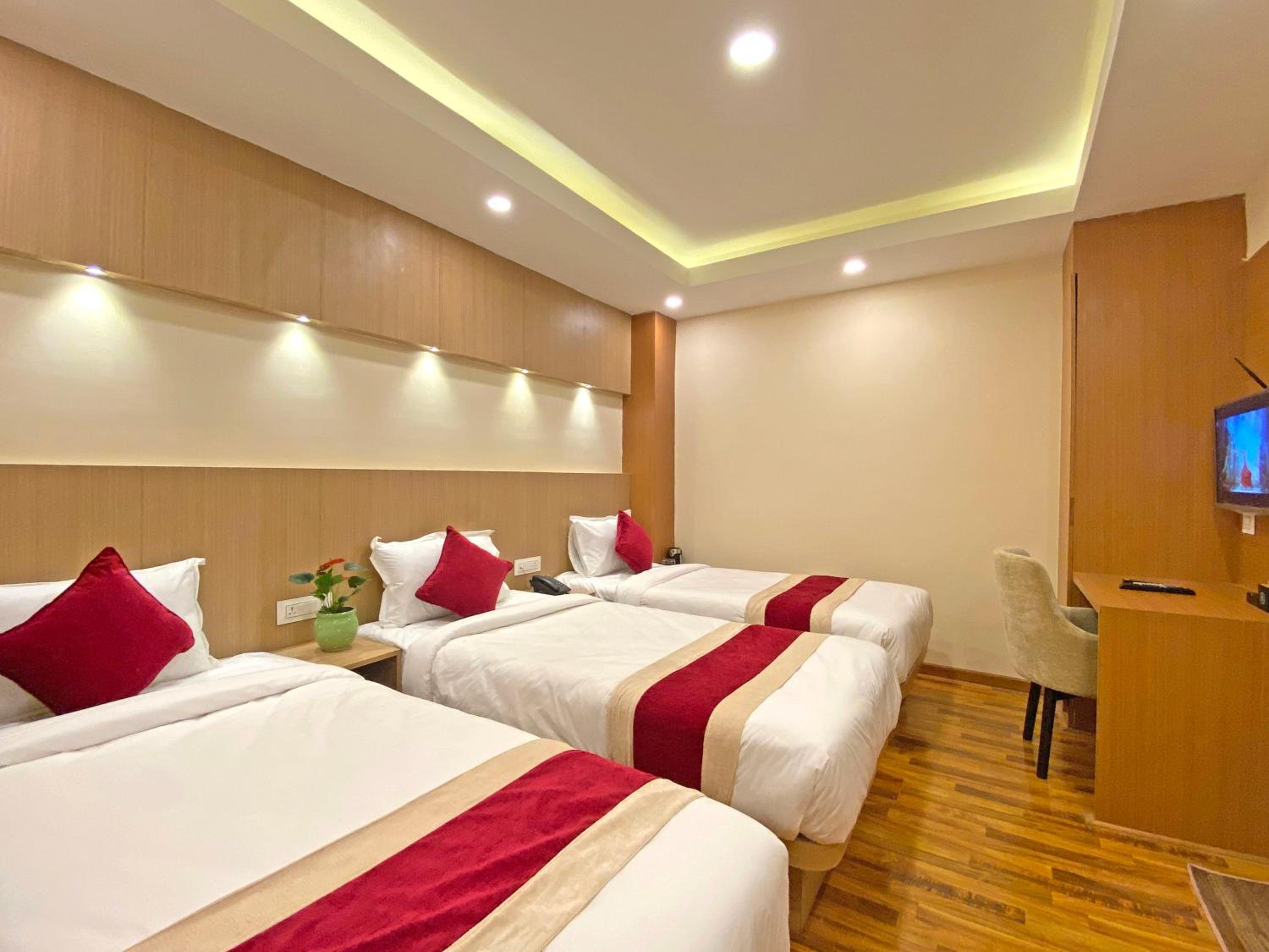 Deluxe Triple Room - Photo 15