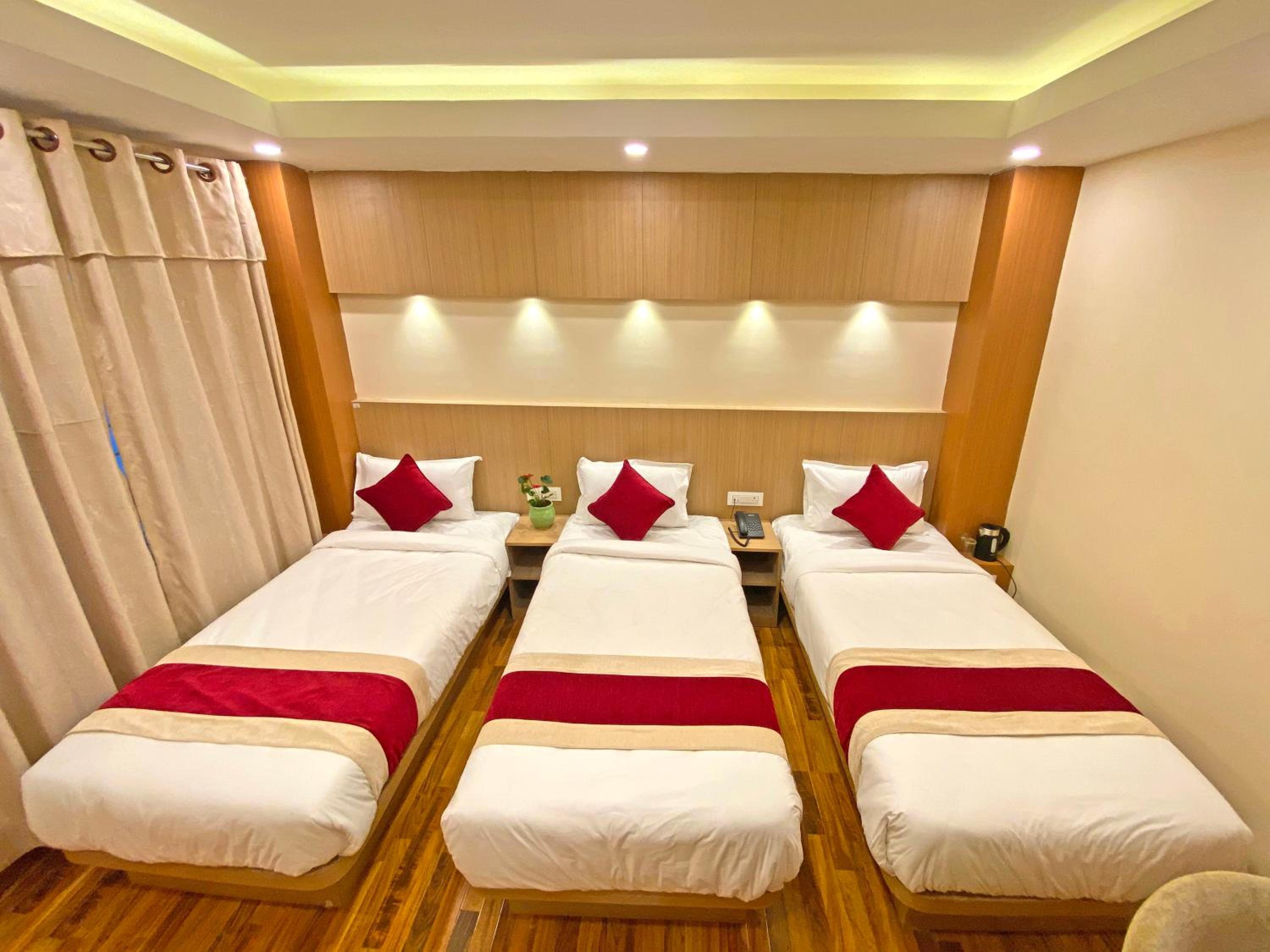 Deluxe Triple Room - Photo 17
