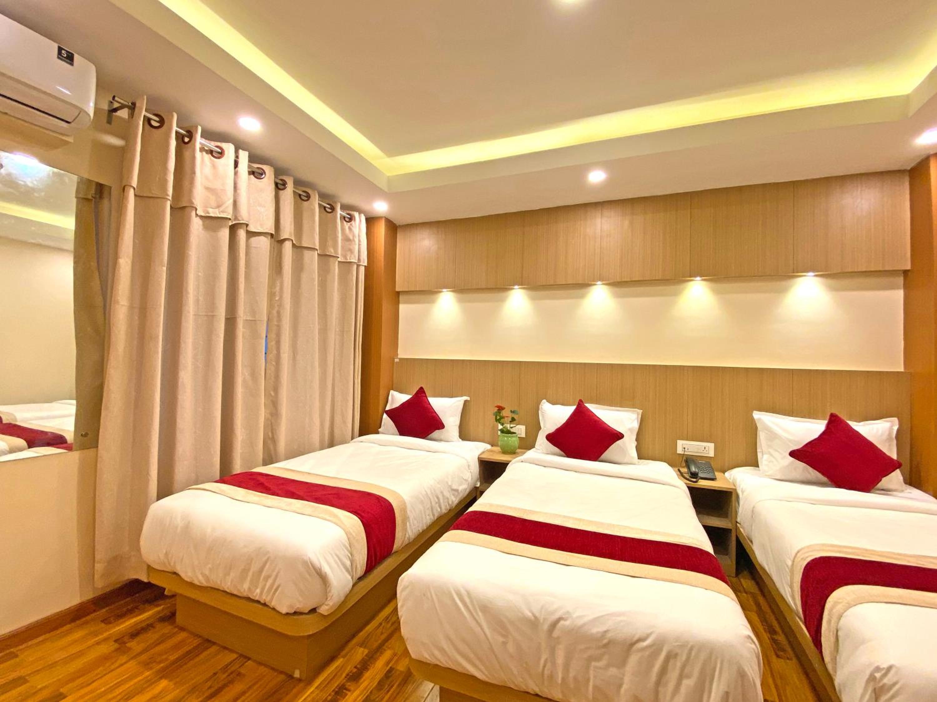 Deluxe Triple Room - Photo 18