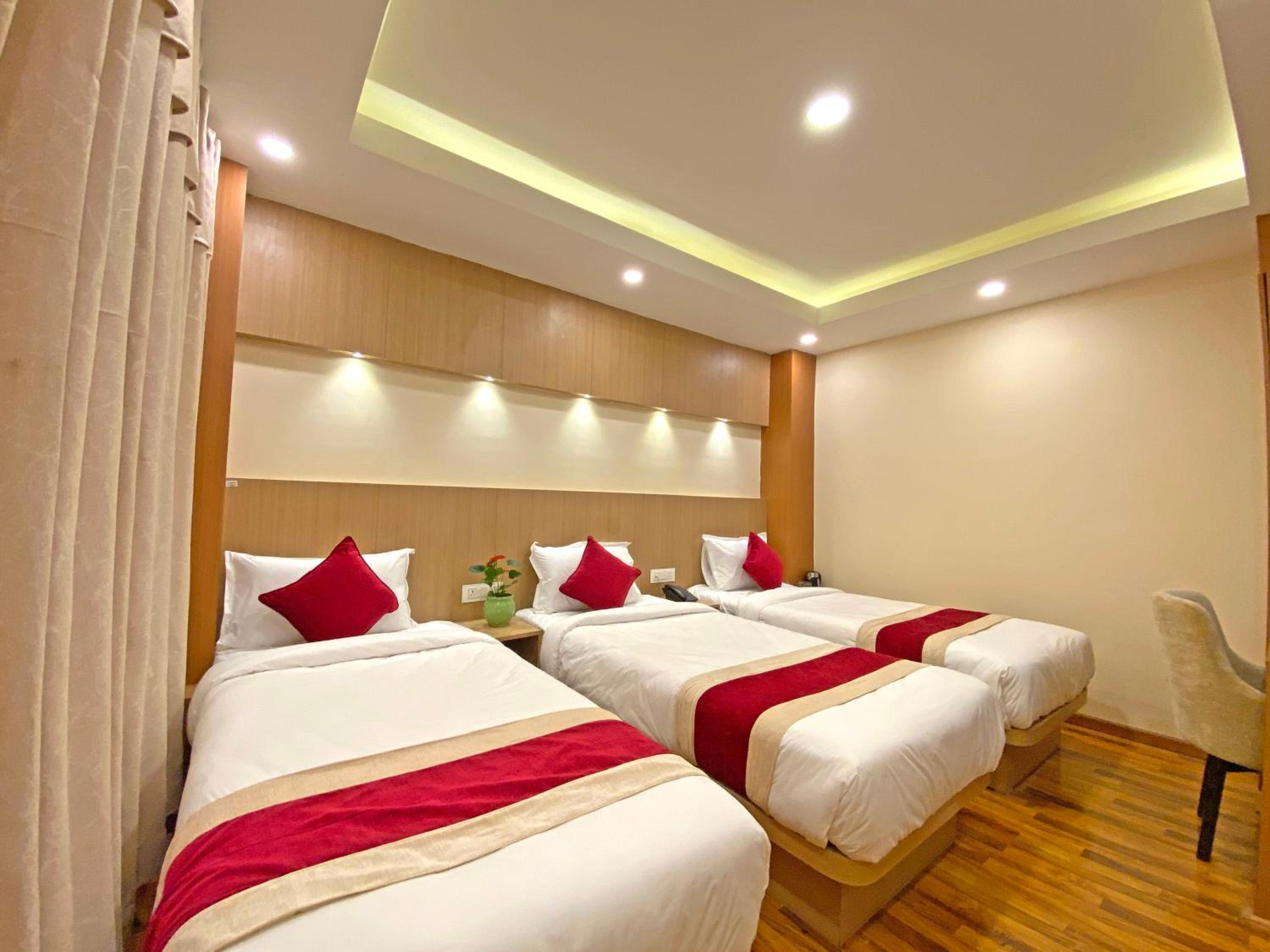 Deluxe Triple Room - Photo 19