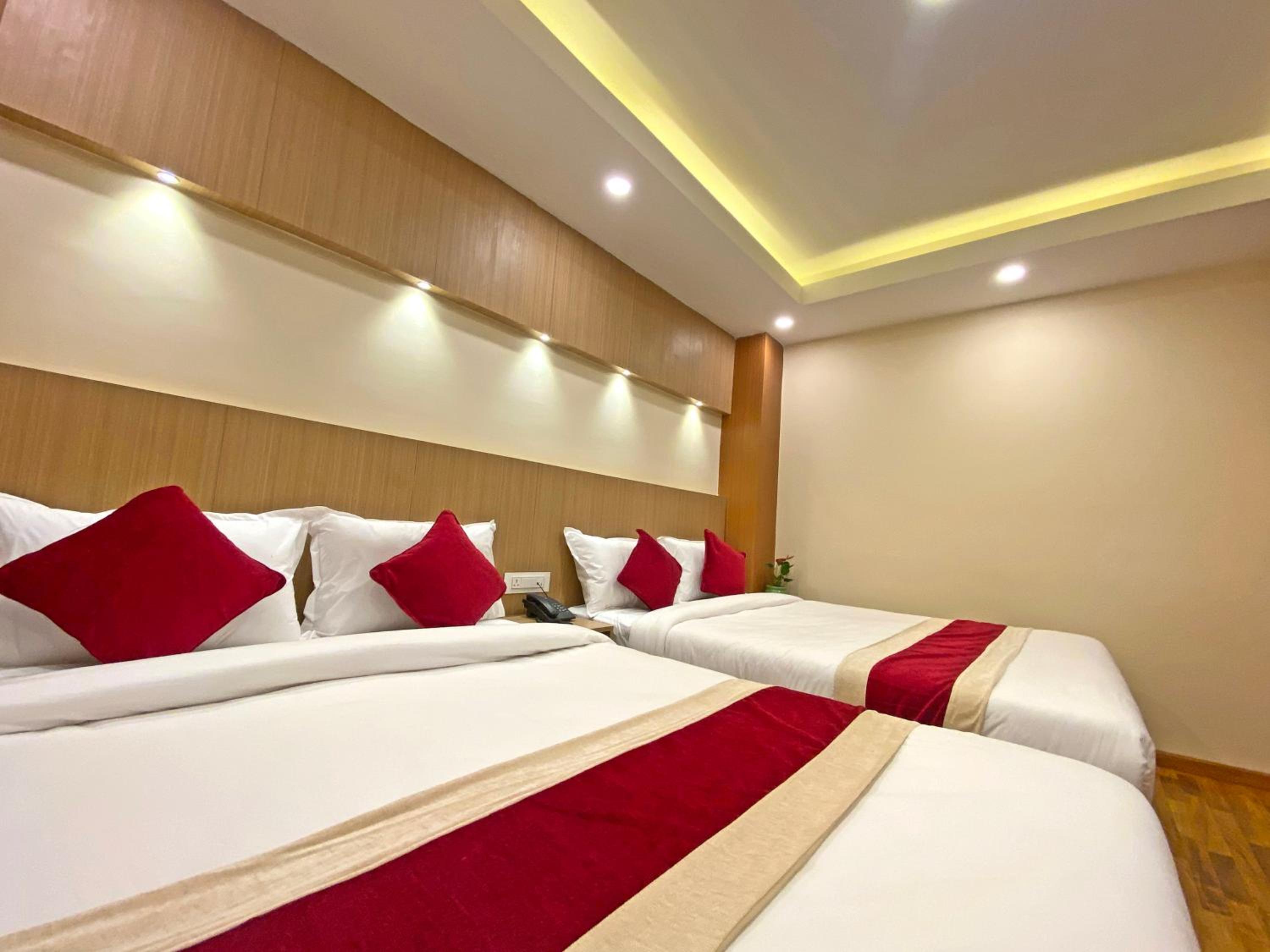Deluxe Quadruple Room - Photo 8