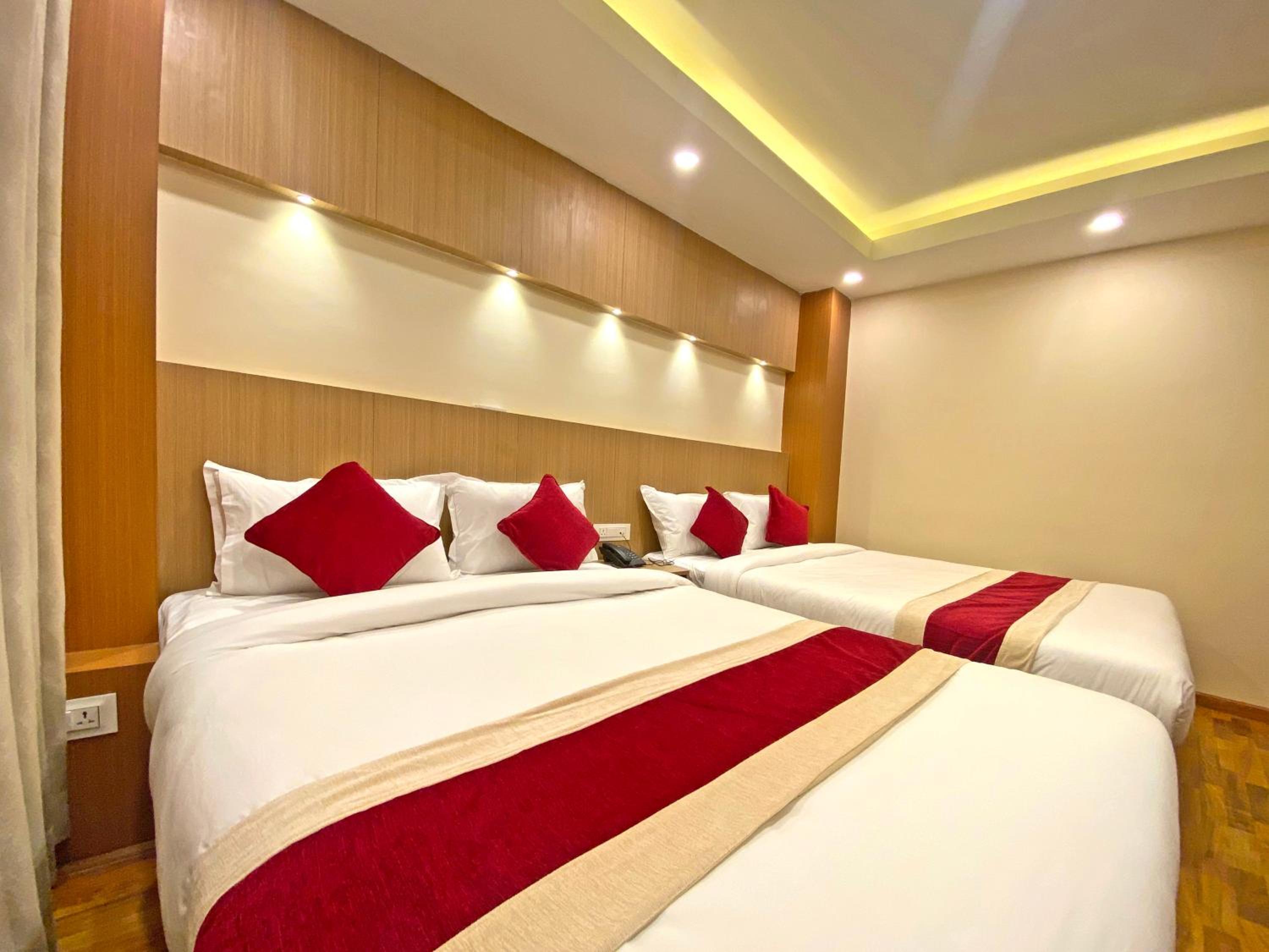 Deluxe Quadruple Room - Photo 18