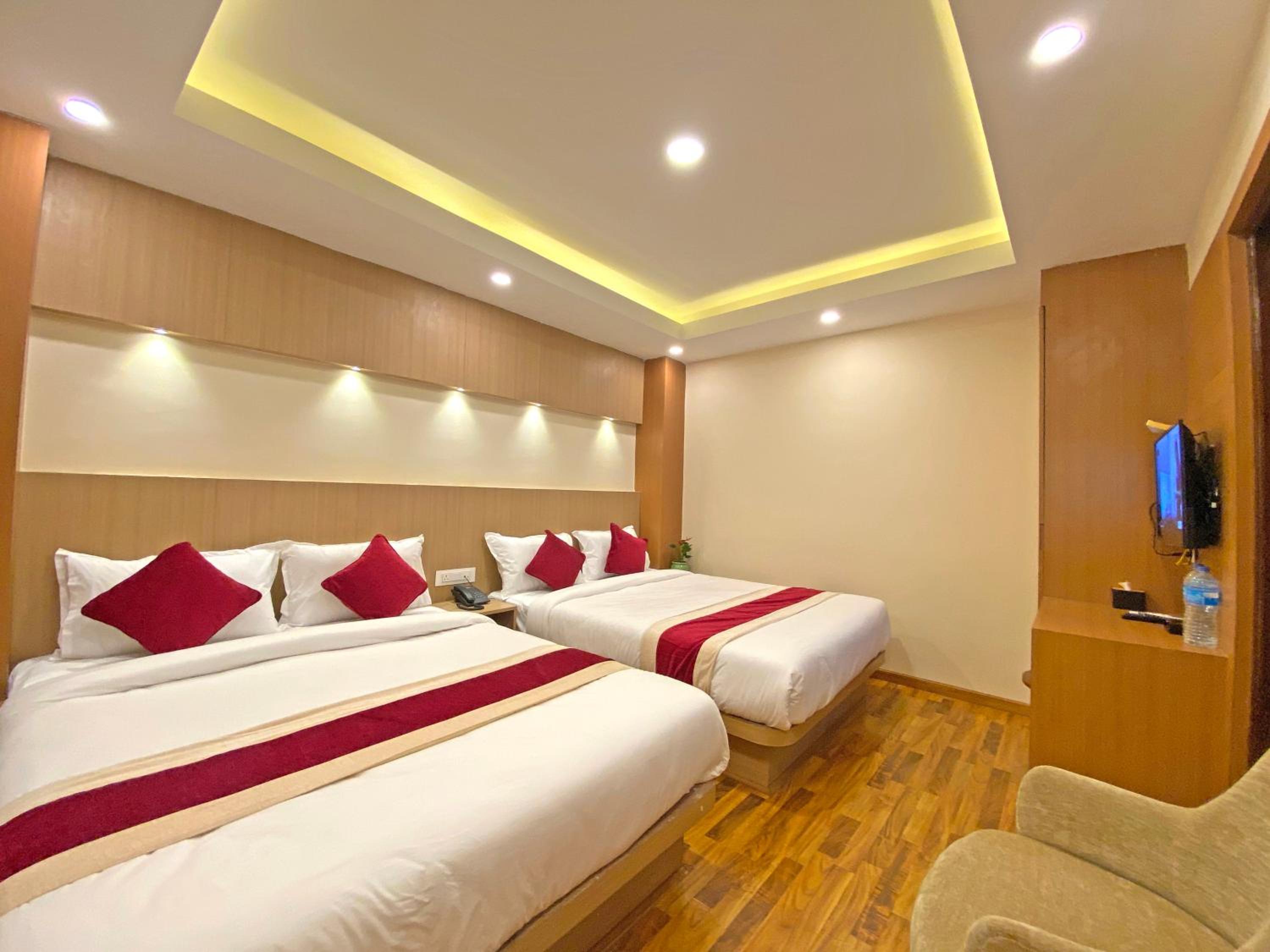 Deluxe Quadruple Room - Photo 19