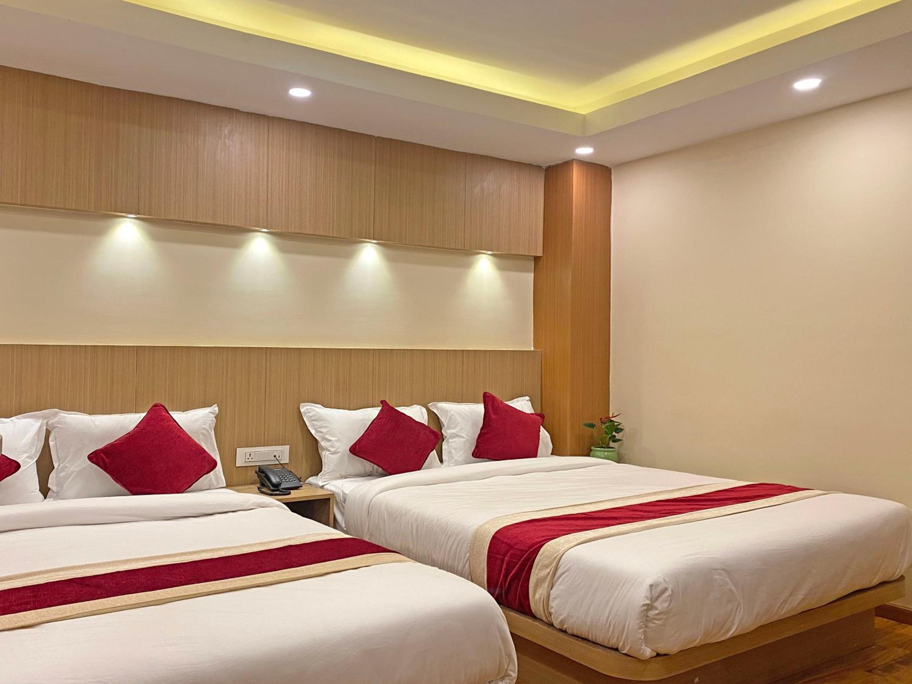 Deluxe Quadruple Room - Photo 17