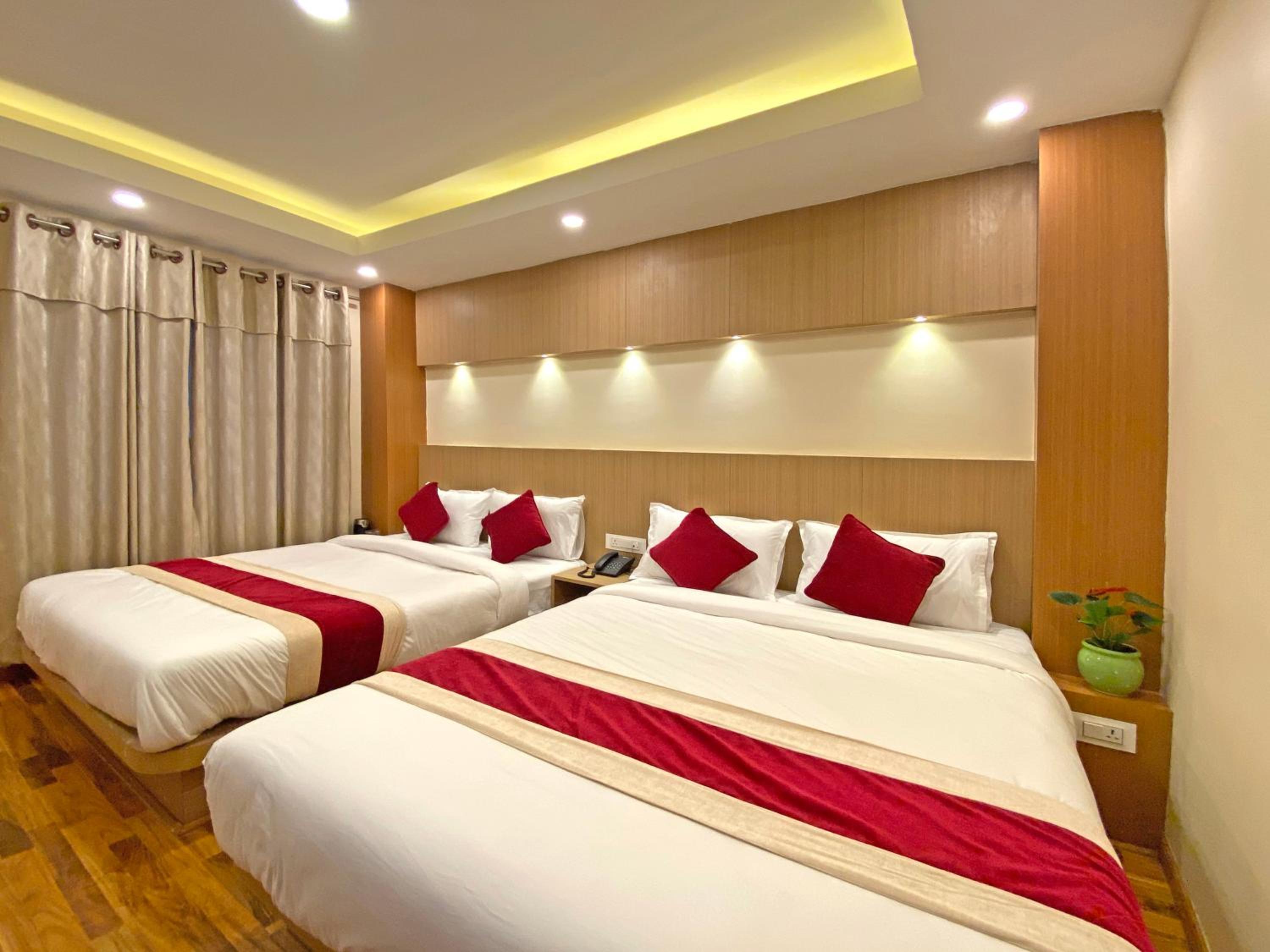 Deluxe Quadruple Room - Photo 7