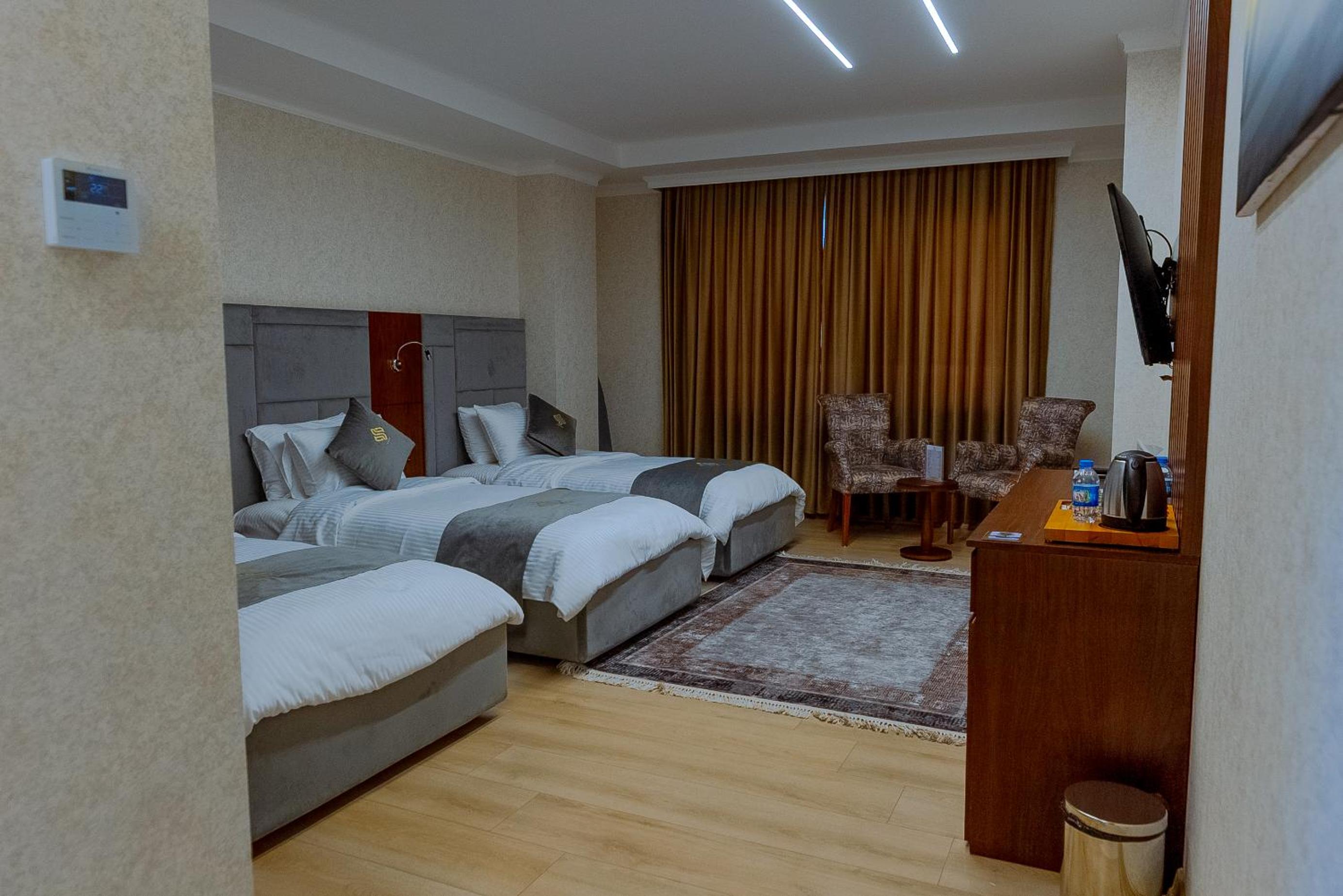 Deluxe Triple Room
