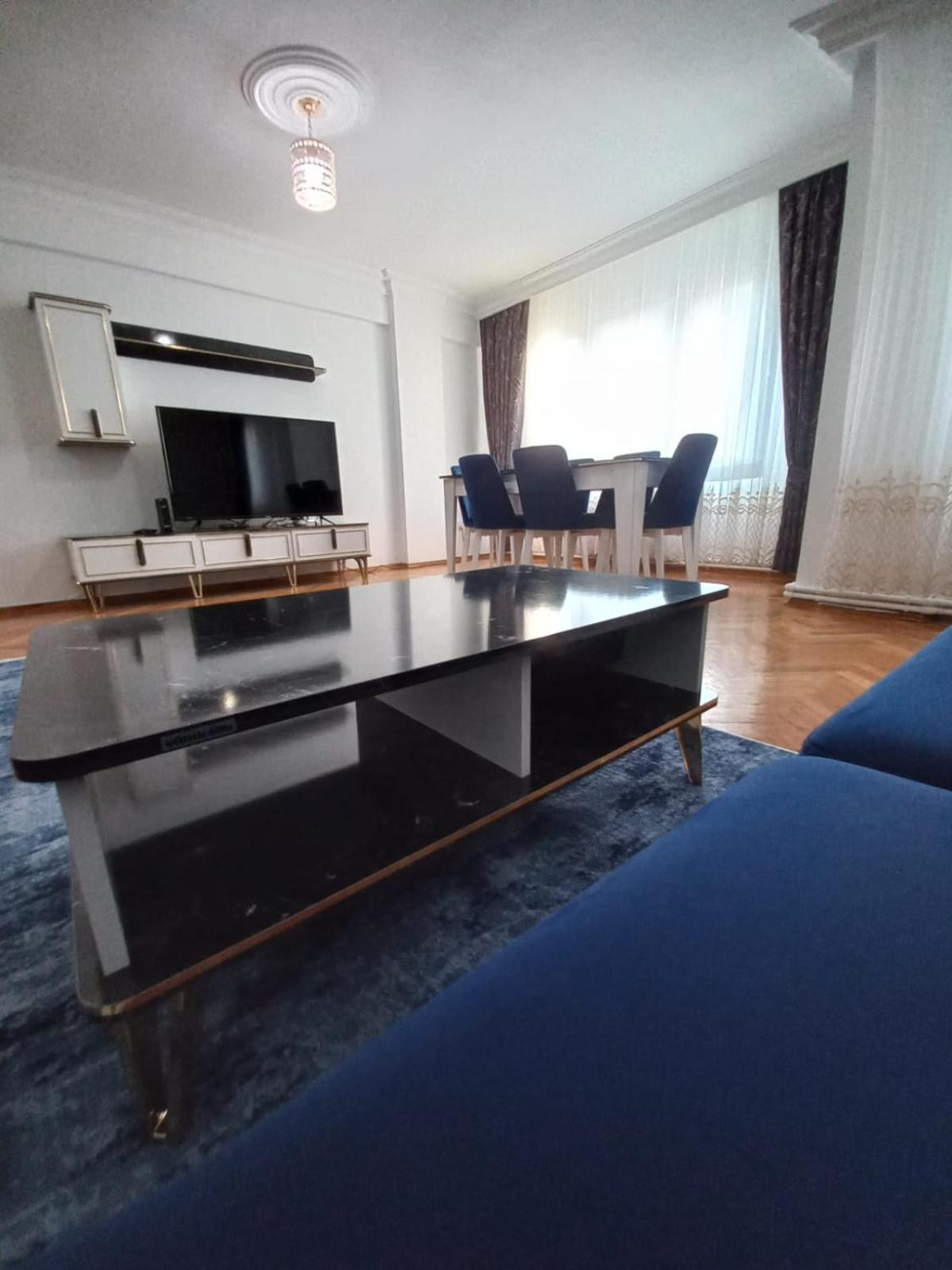 Three-Bedroom Apartment photo 1