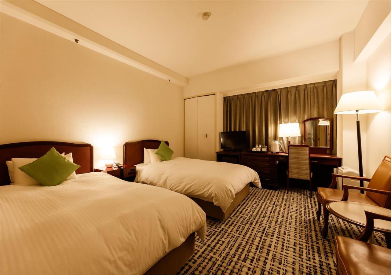 Twin Room - Non-Smoking - Photo 1