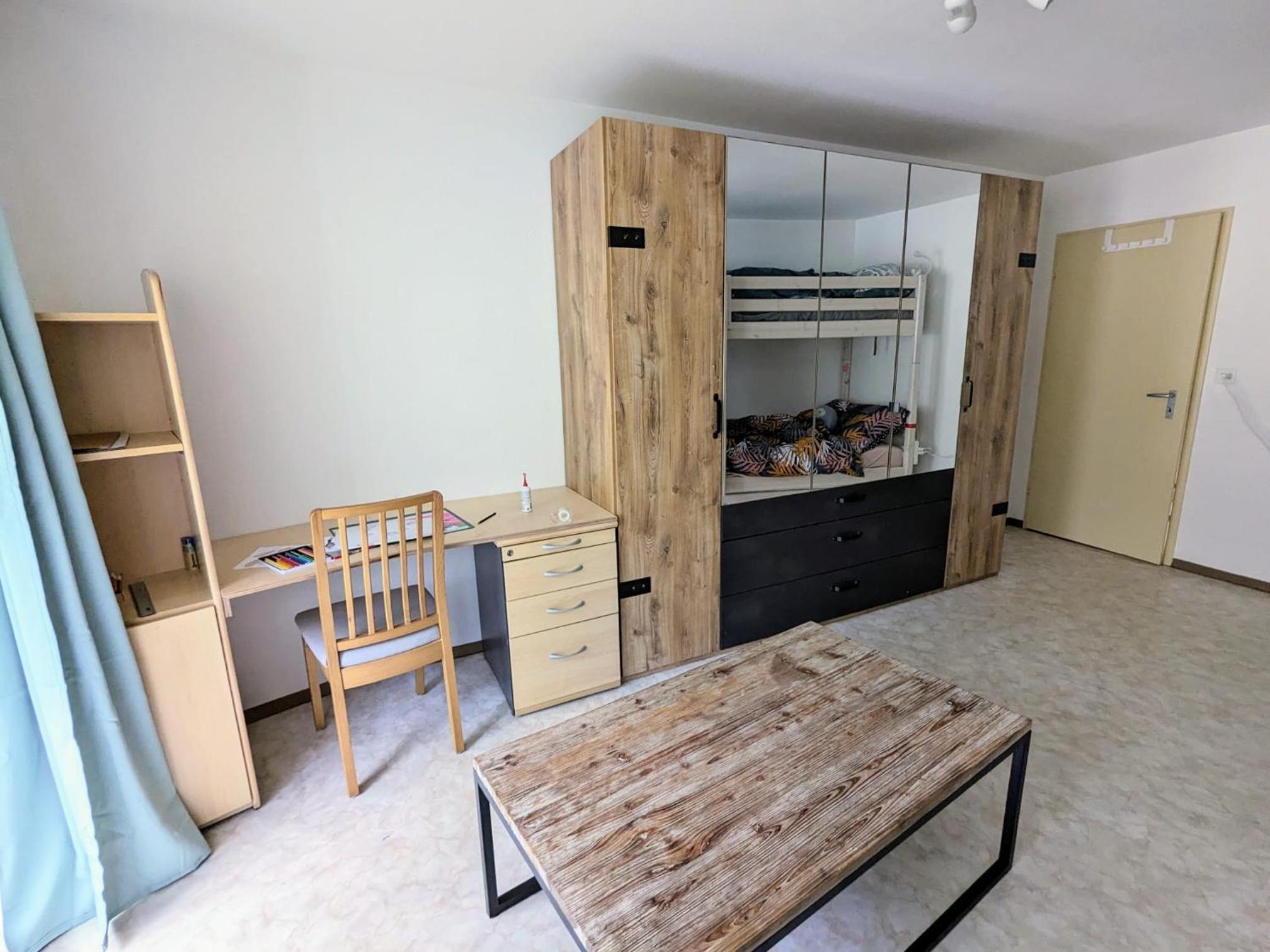 Three-Bedroom Apartment photo 1