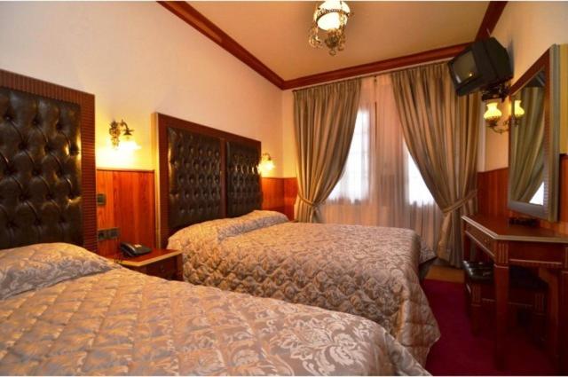 Triple Room - Photo 1