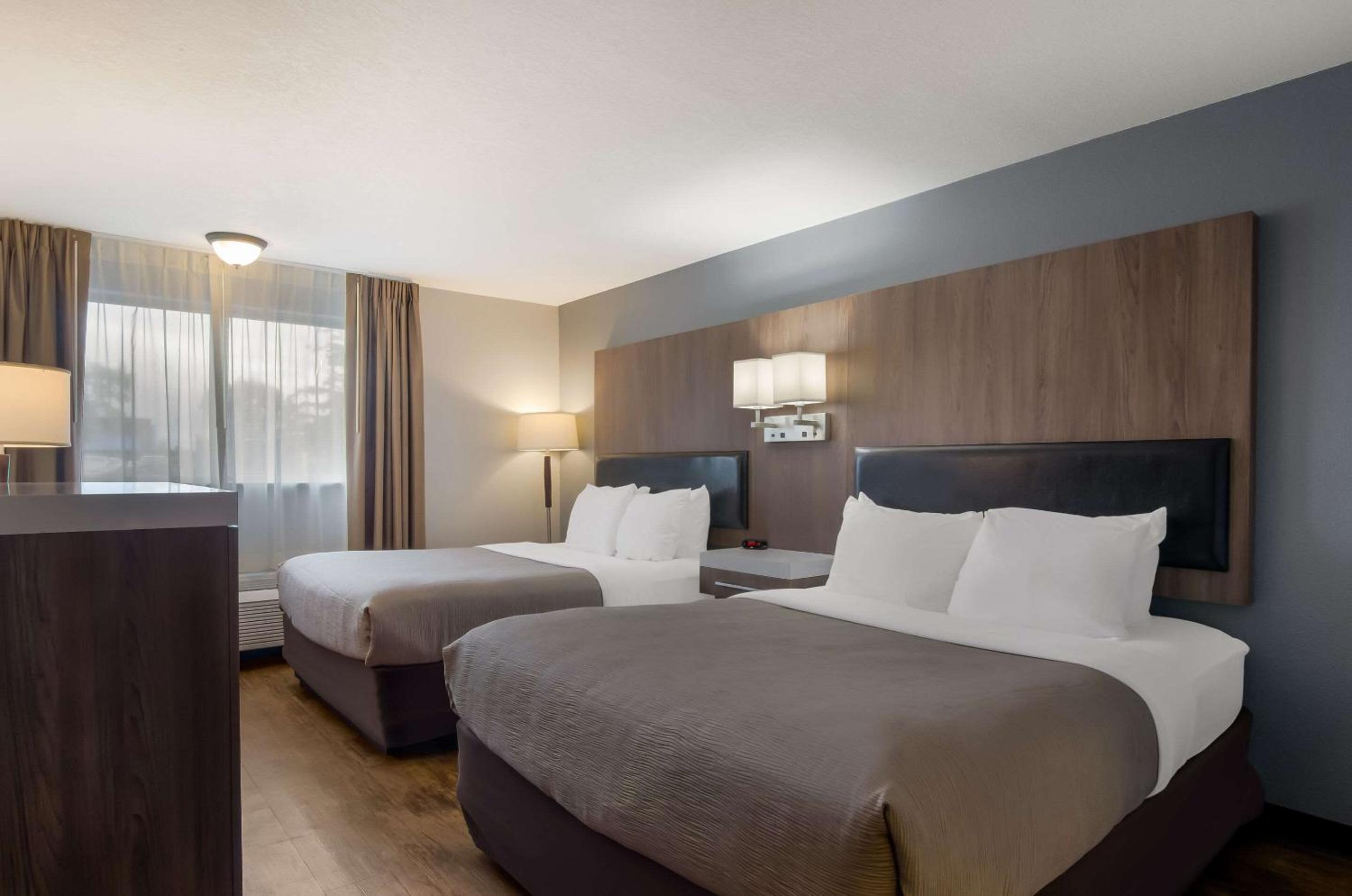 Queen Room with Two Queen Beds - Non-Smoking - Photo 1